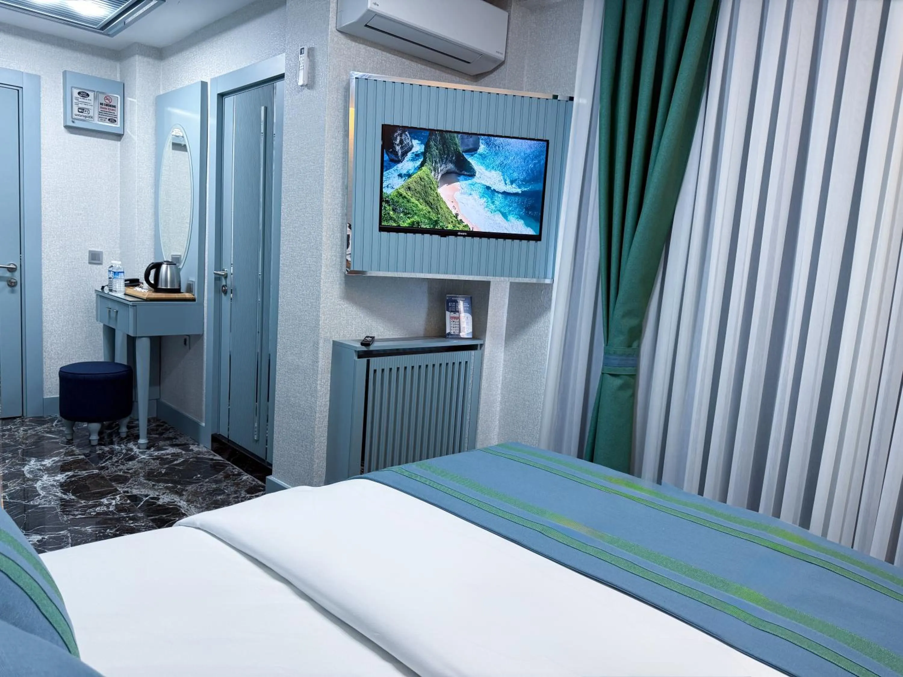 Bed in Santa Rio Gold Taxim Hotel