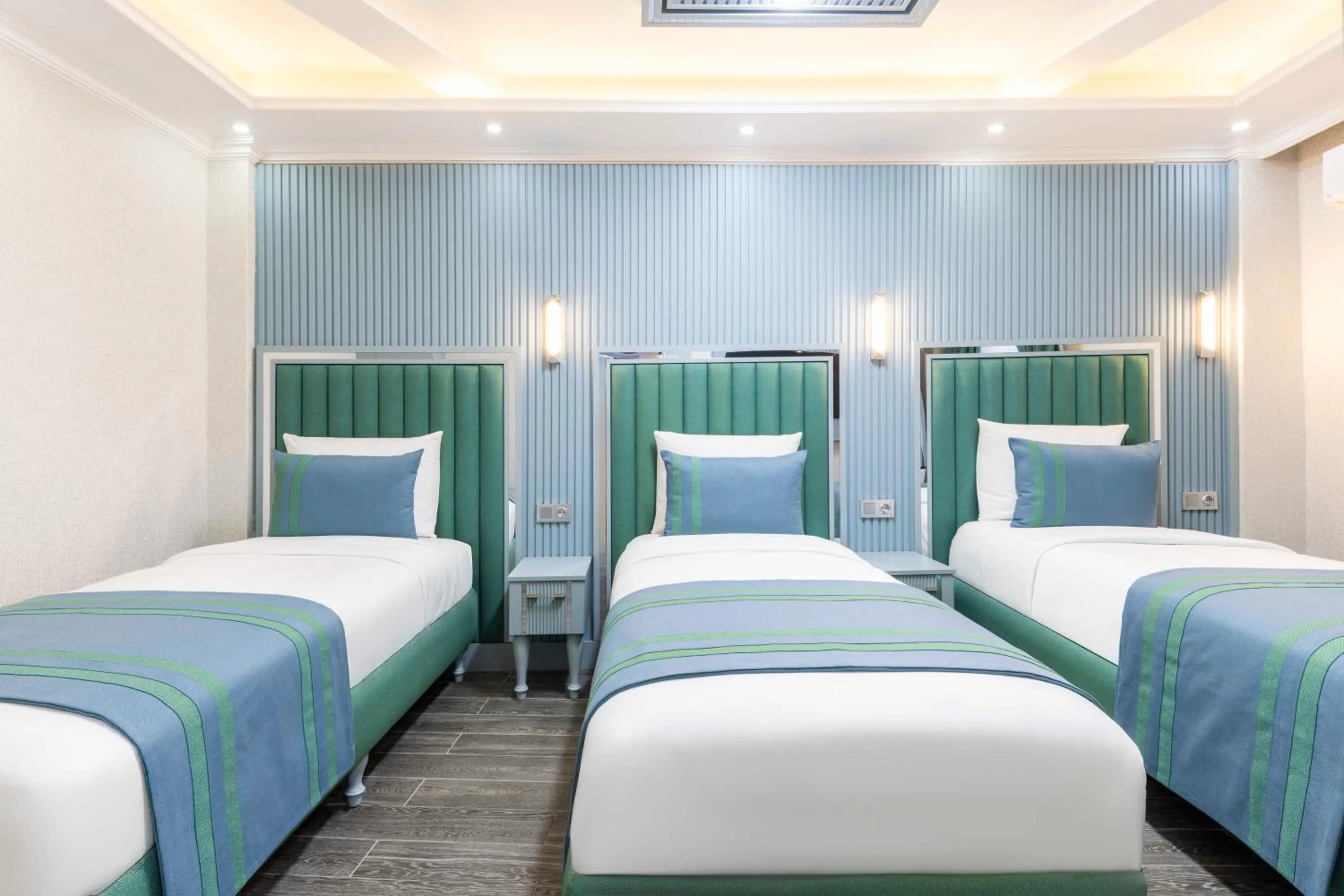 Bed in Santa Rio Gold Taxim Hotel