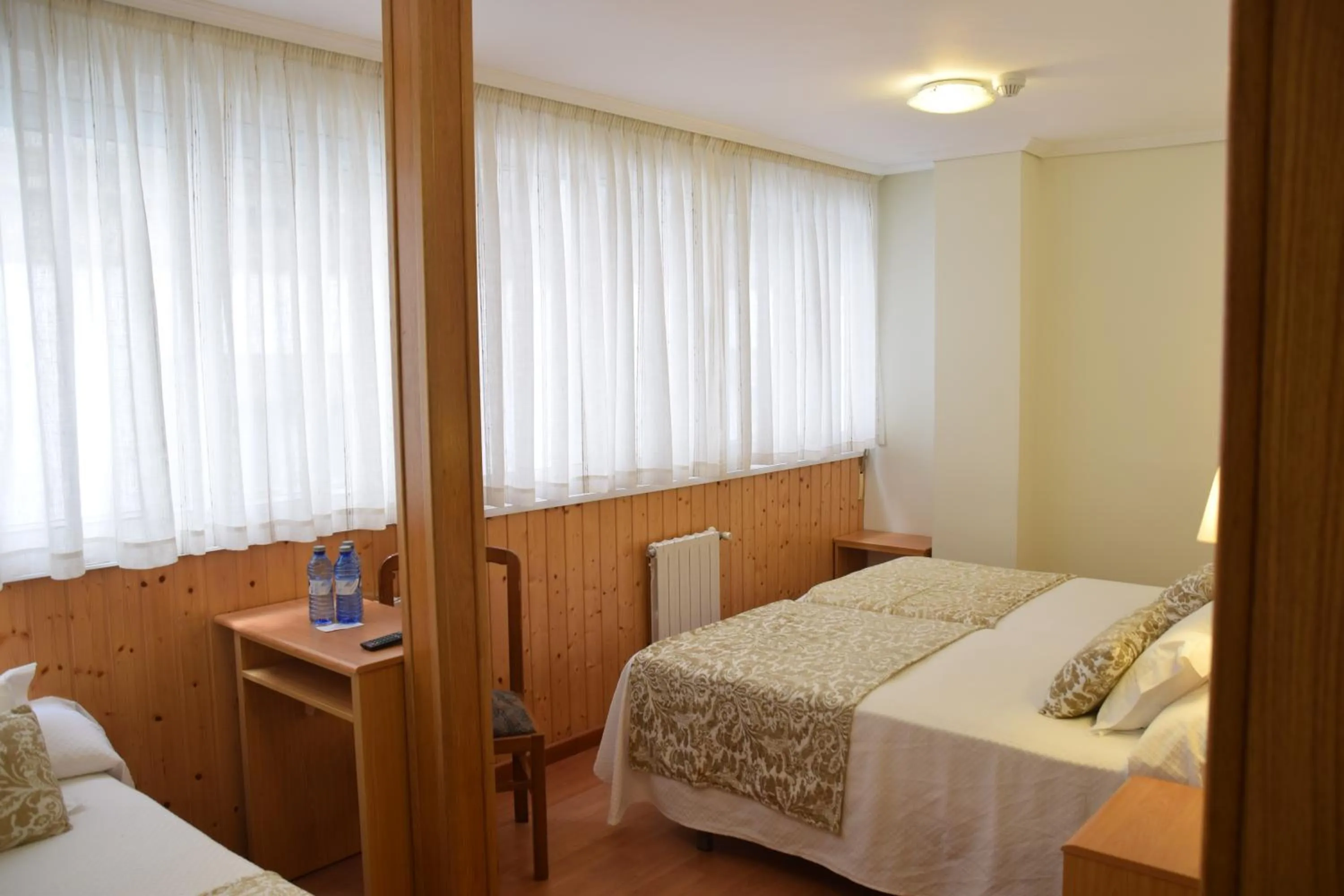 Photo of the whole room, Bed in Hostal Anosa Casa