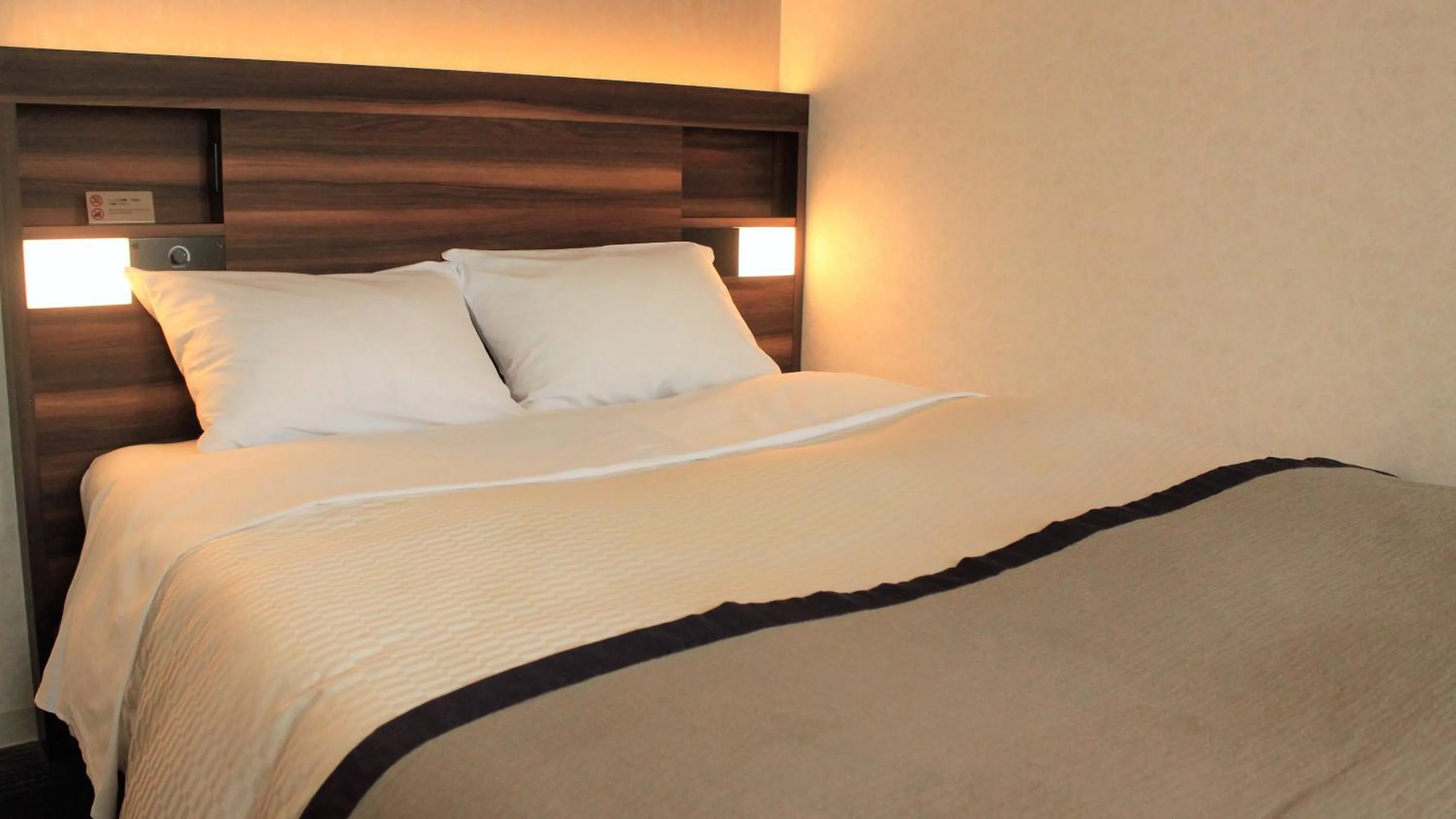 Bed in Kochi Pacific Hotel