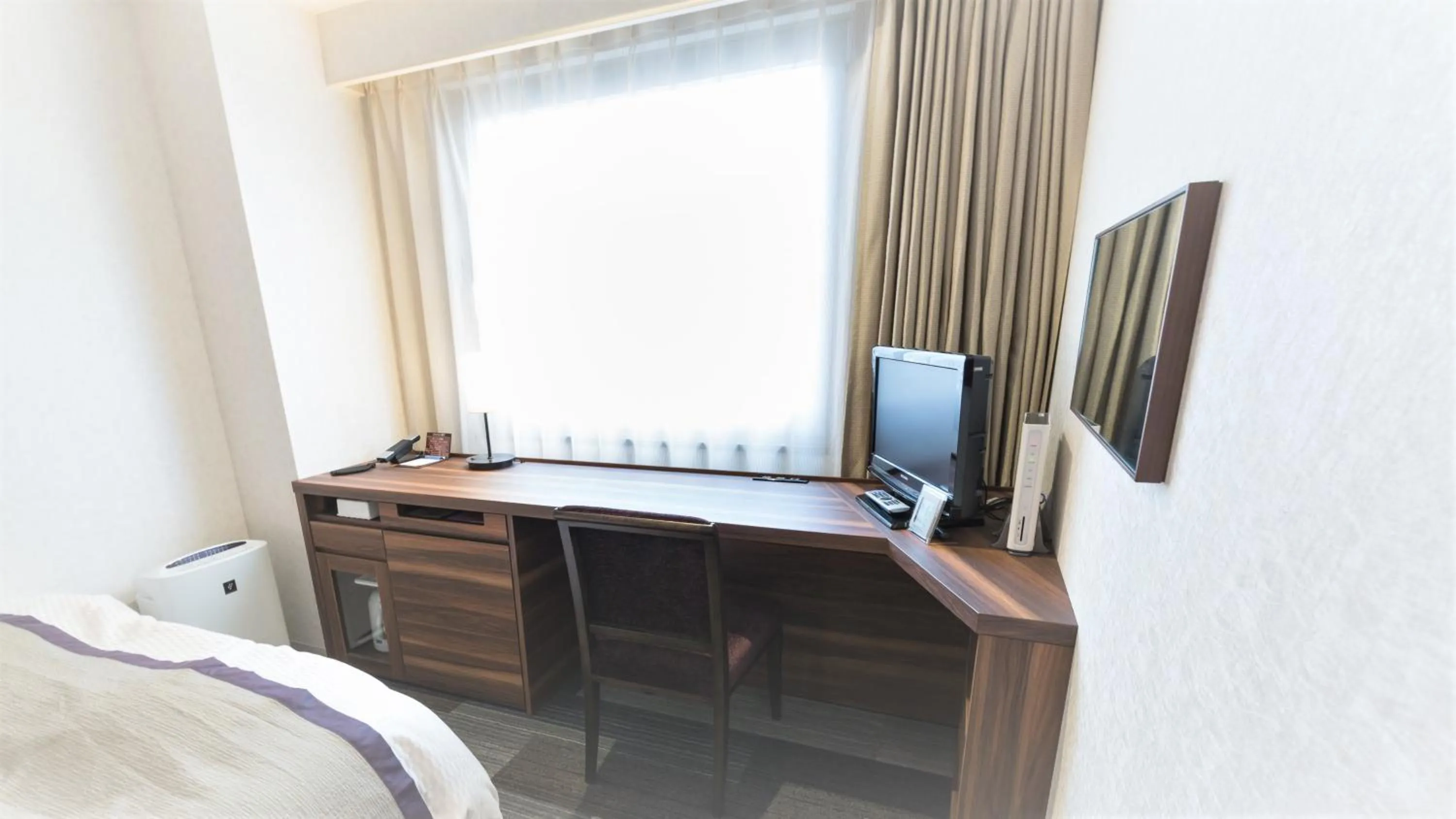 Photo of the whole room, Bed in Kochi Pacific Hotel