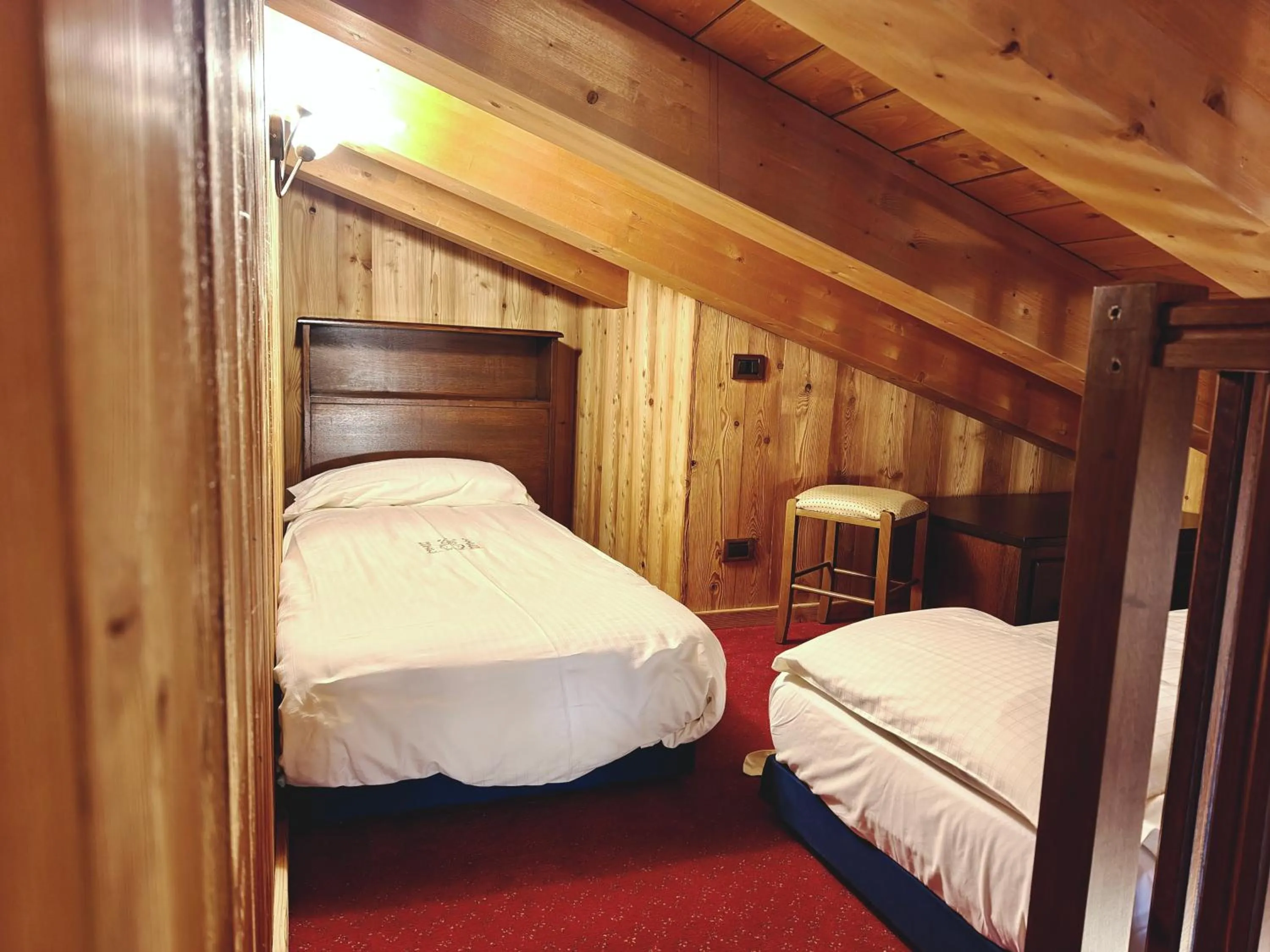 Bed in Hotel L' Aiglon