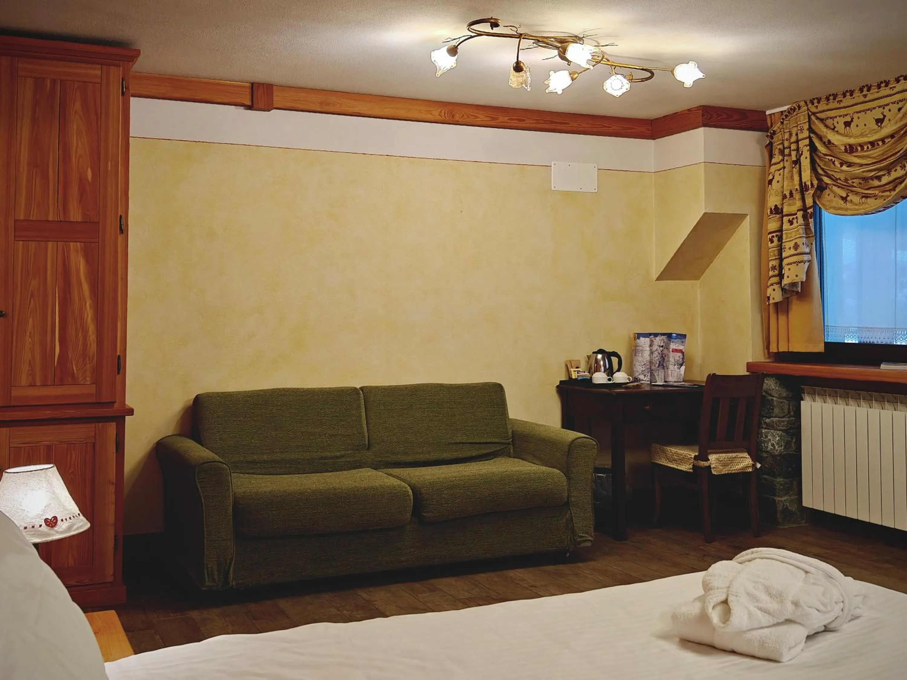 Bed in Hotel L' Aiglon