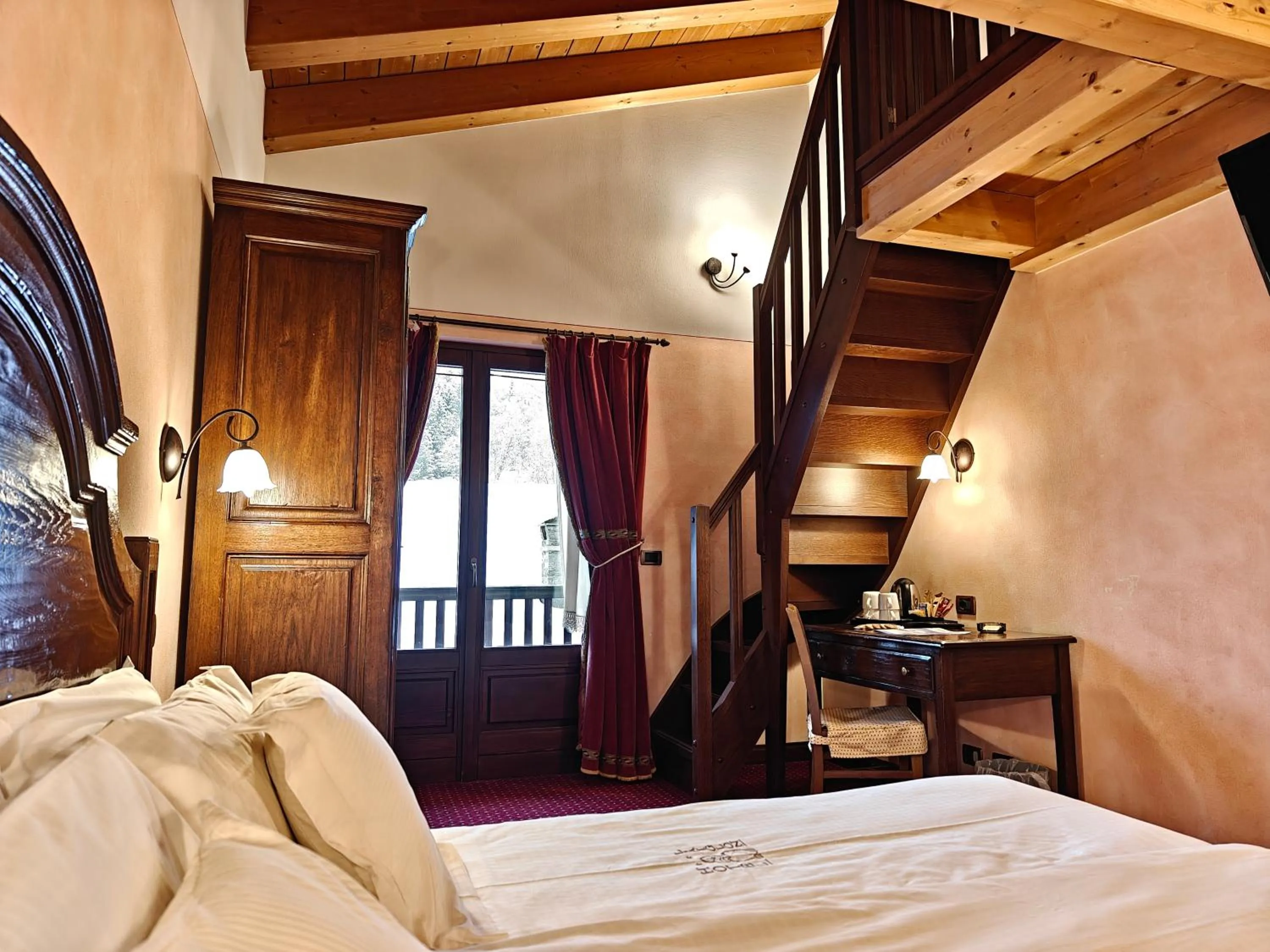 Bed in Hotel L' Aiglon