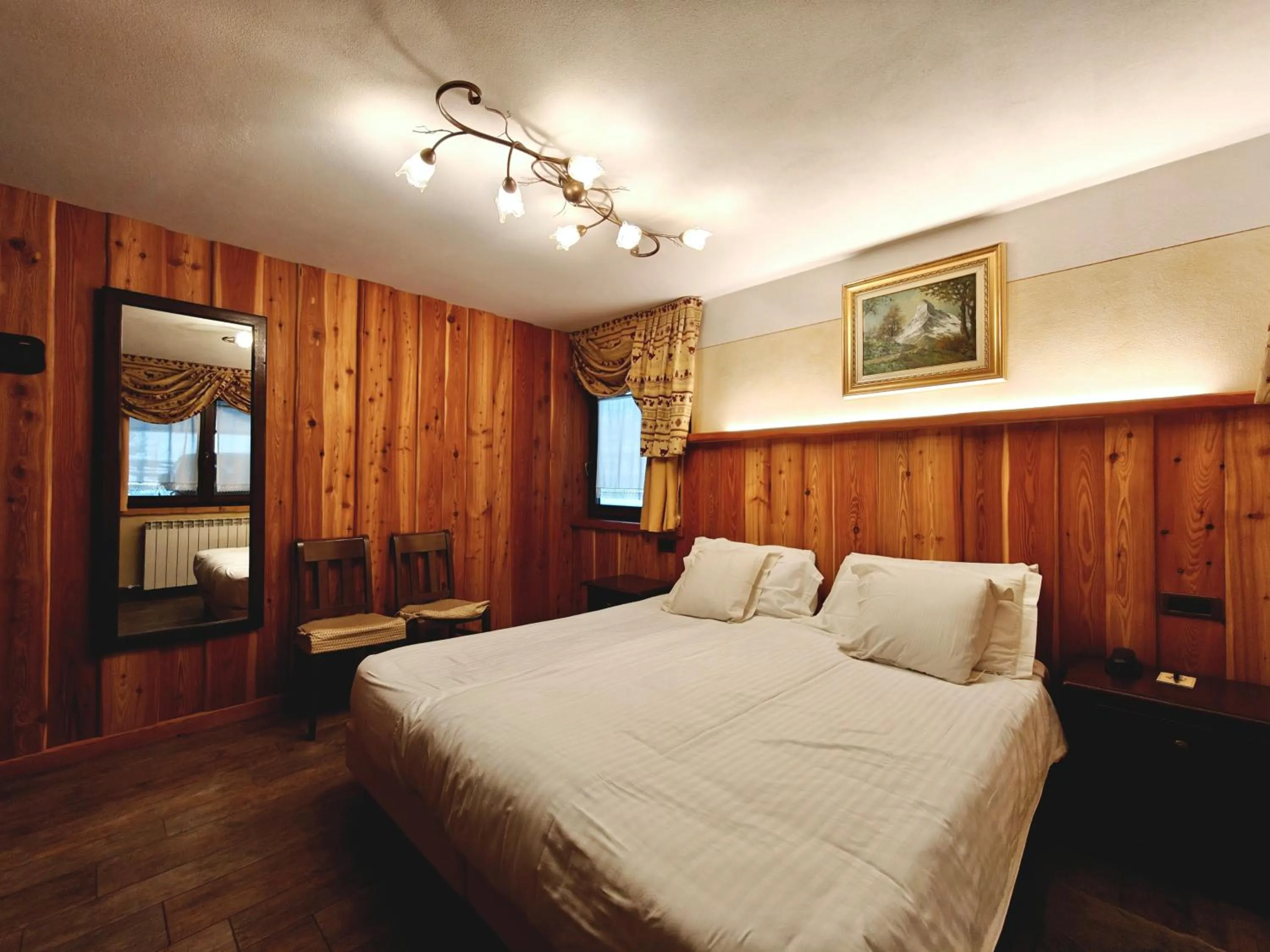 Bed in Hotel L' Aiglon