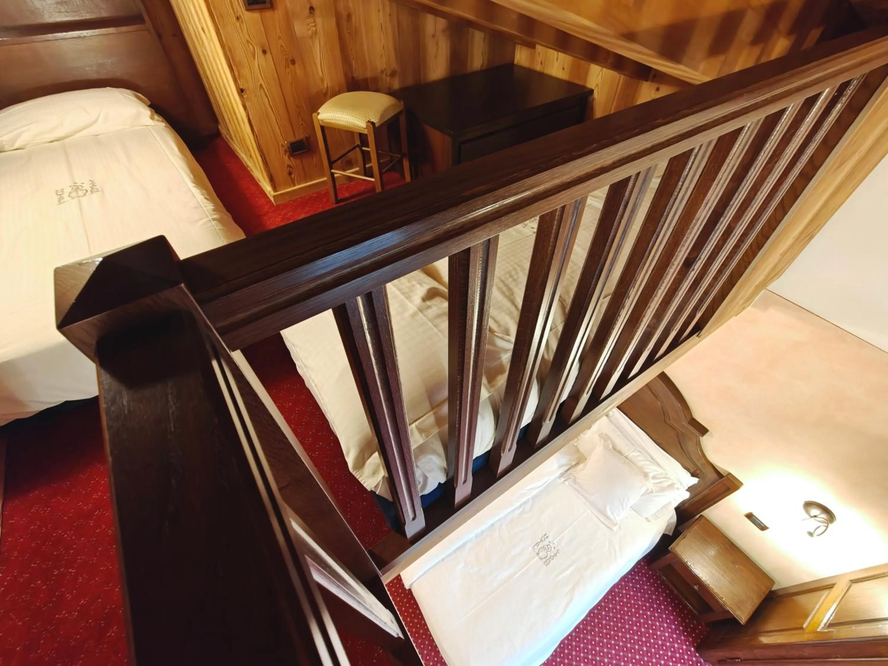 Bed in Hotel L' Aiglon