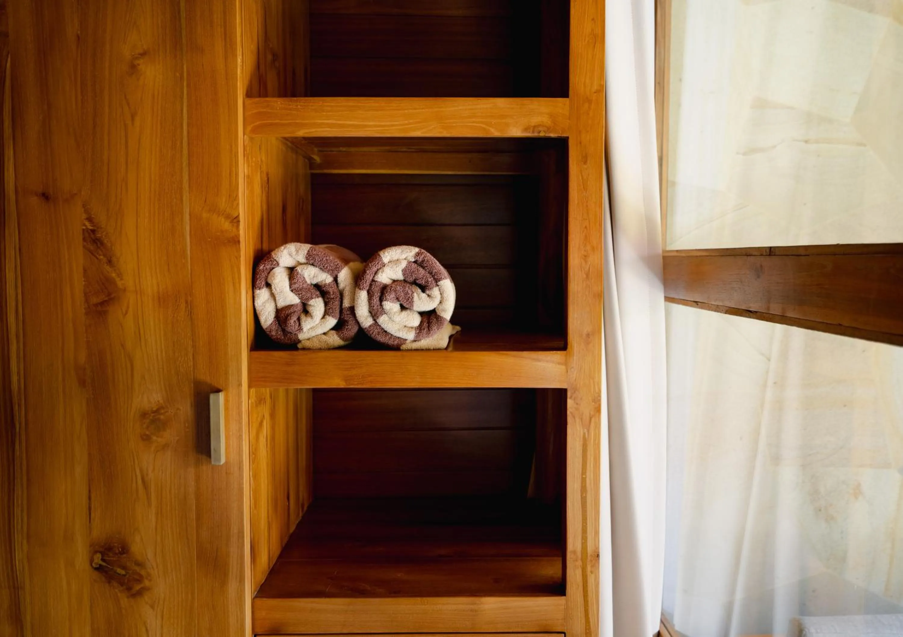 bunk bed in Bale Bali Batubelig by ARM Hospitality