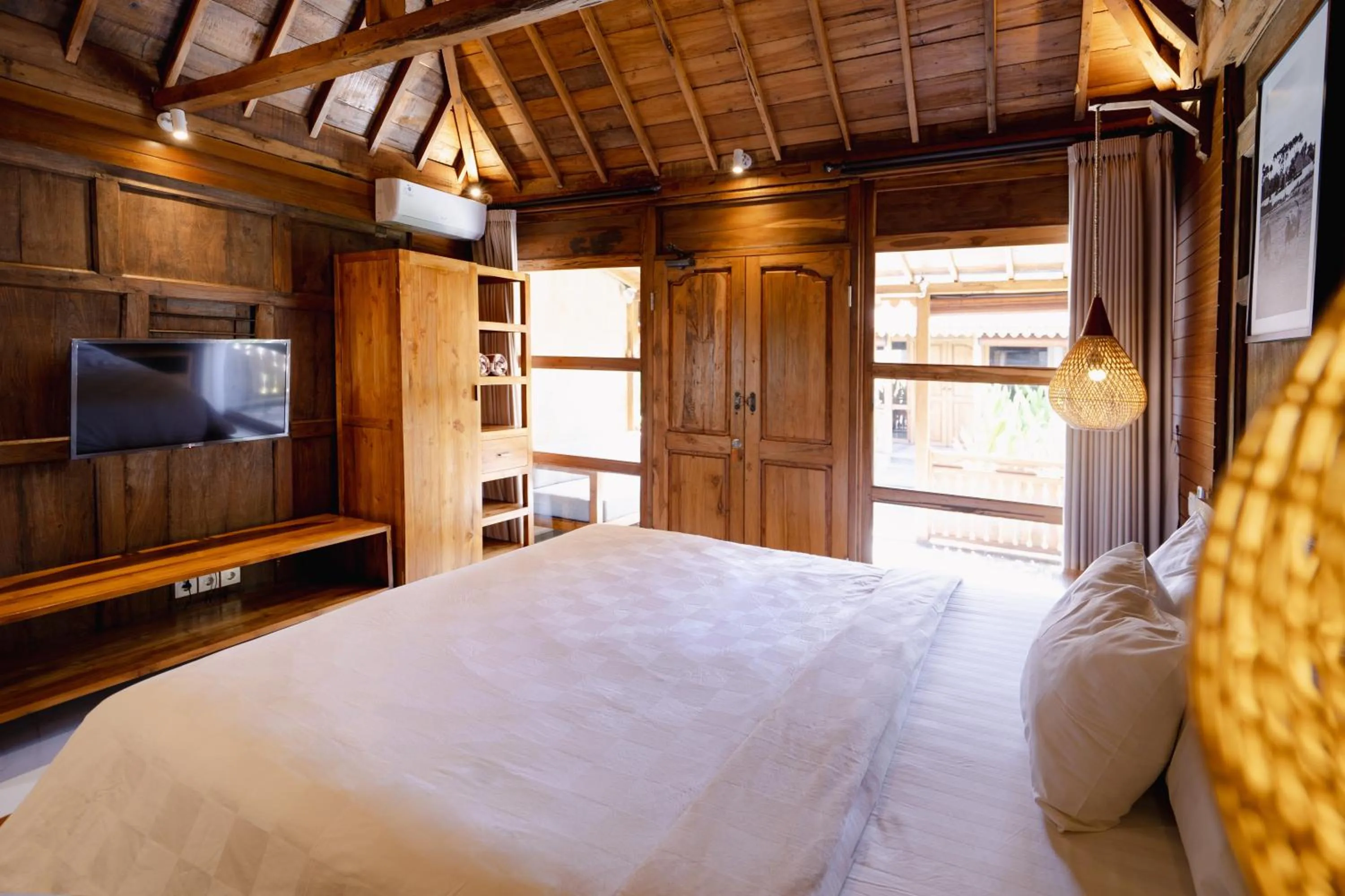 Bed in Bale Bali Batubelig by ARM Hospitality