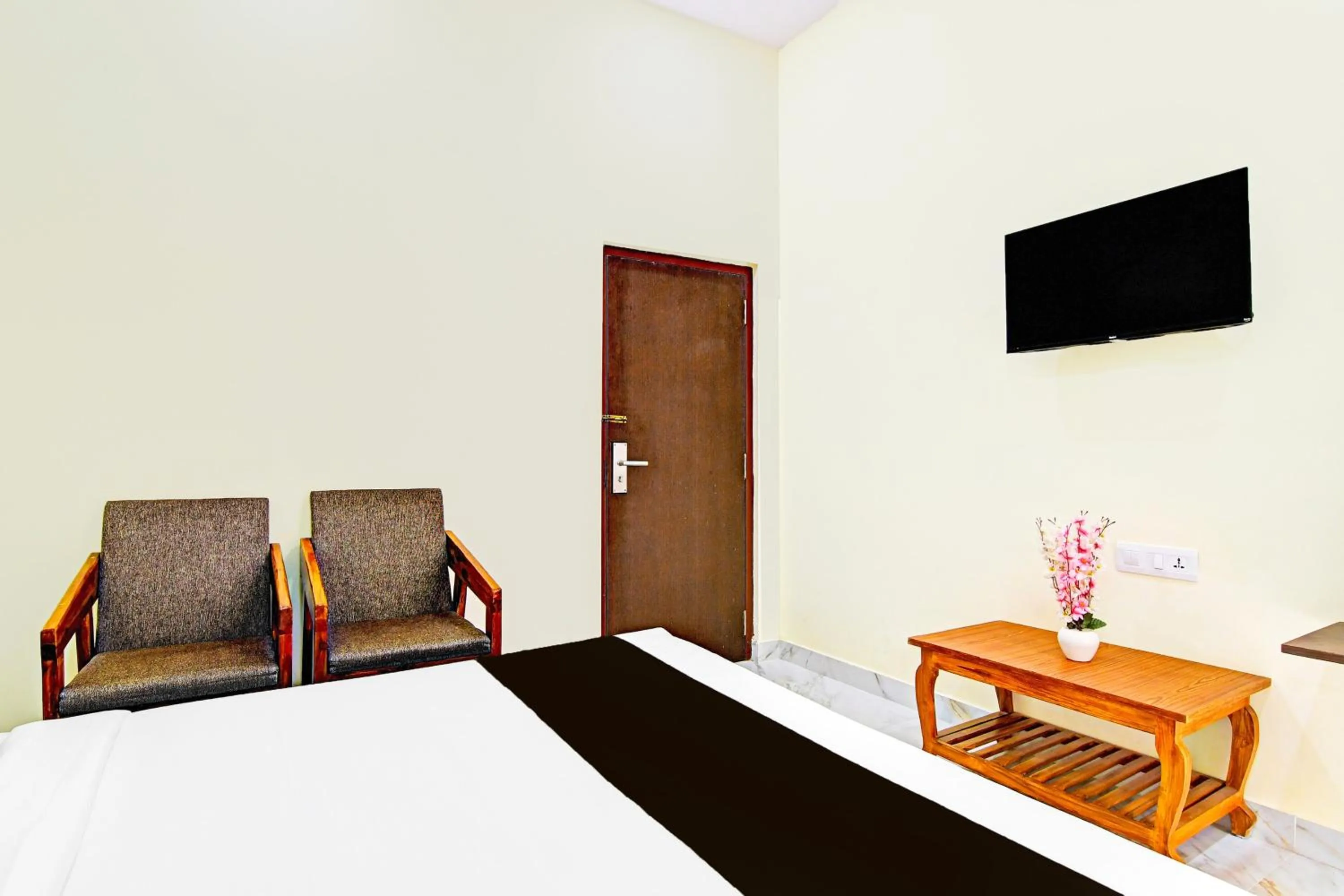 Bedroom in Super Townhouse Dwarakanagar Near Gurudwara