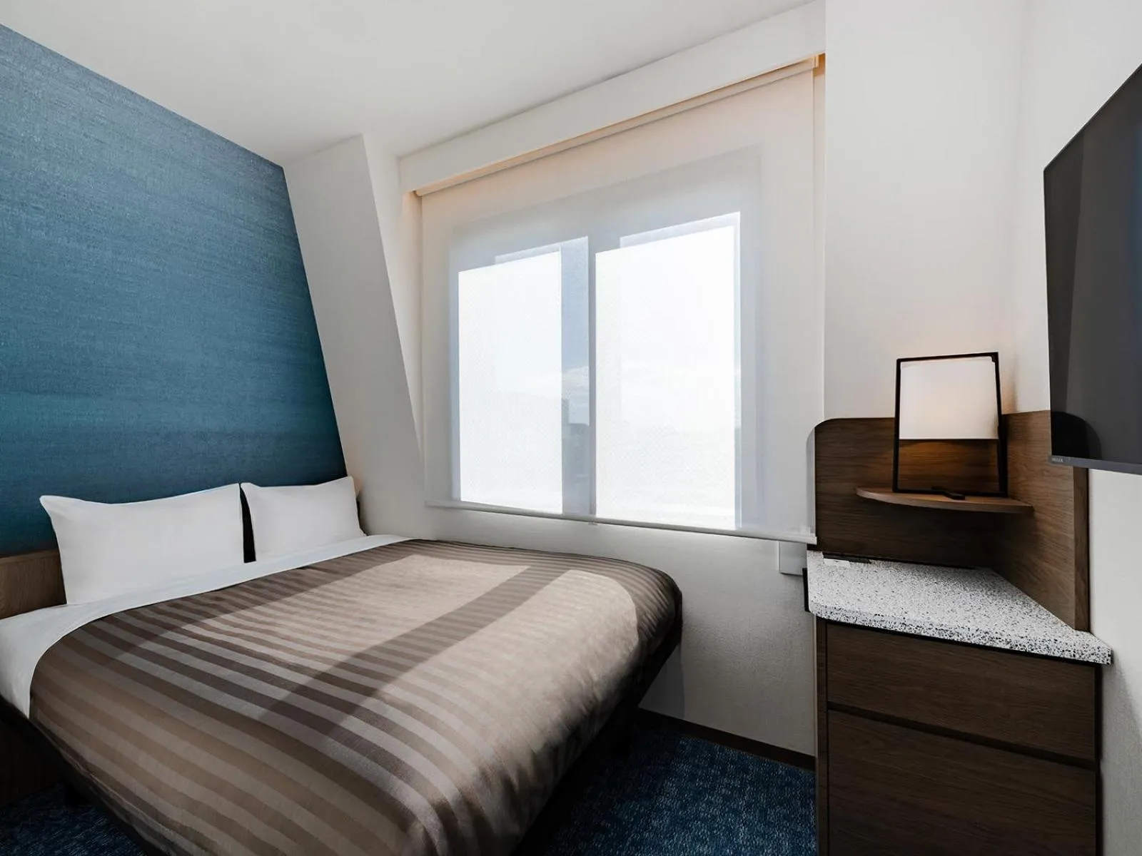 Bed in The OneFive Tokyo Kameido