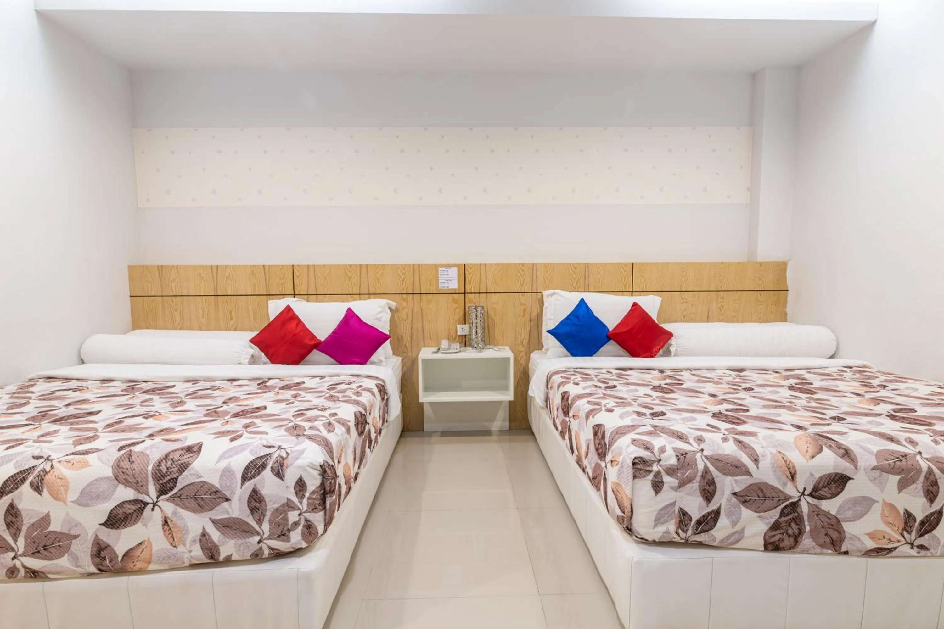 Bed in The Rama Hotel