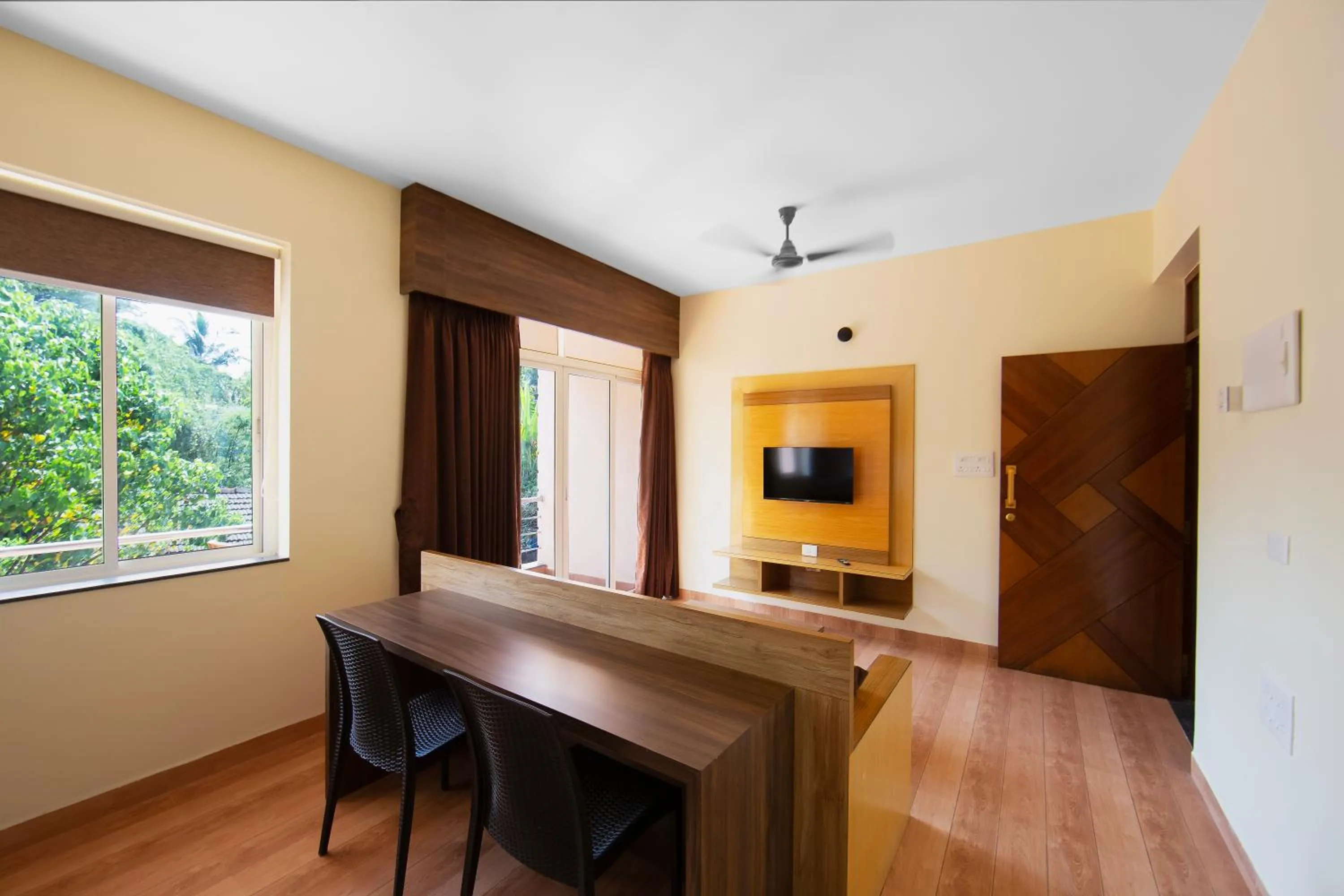 TV and multimedia in Lykke Suites- 2-min Drive to Colva Beach-By Goan Felicidade Hospitality PVT LTD