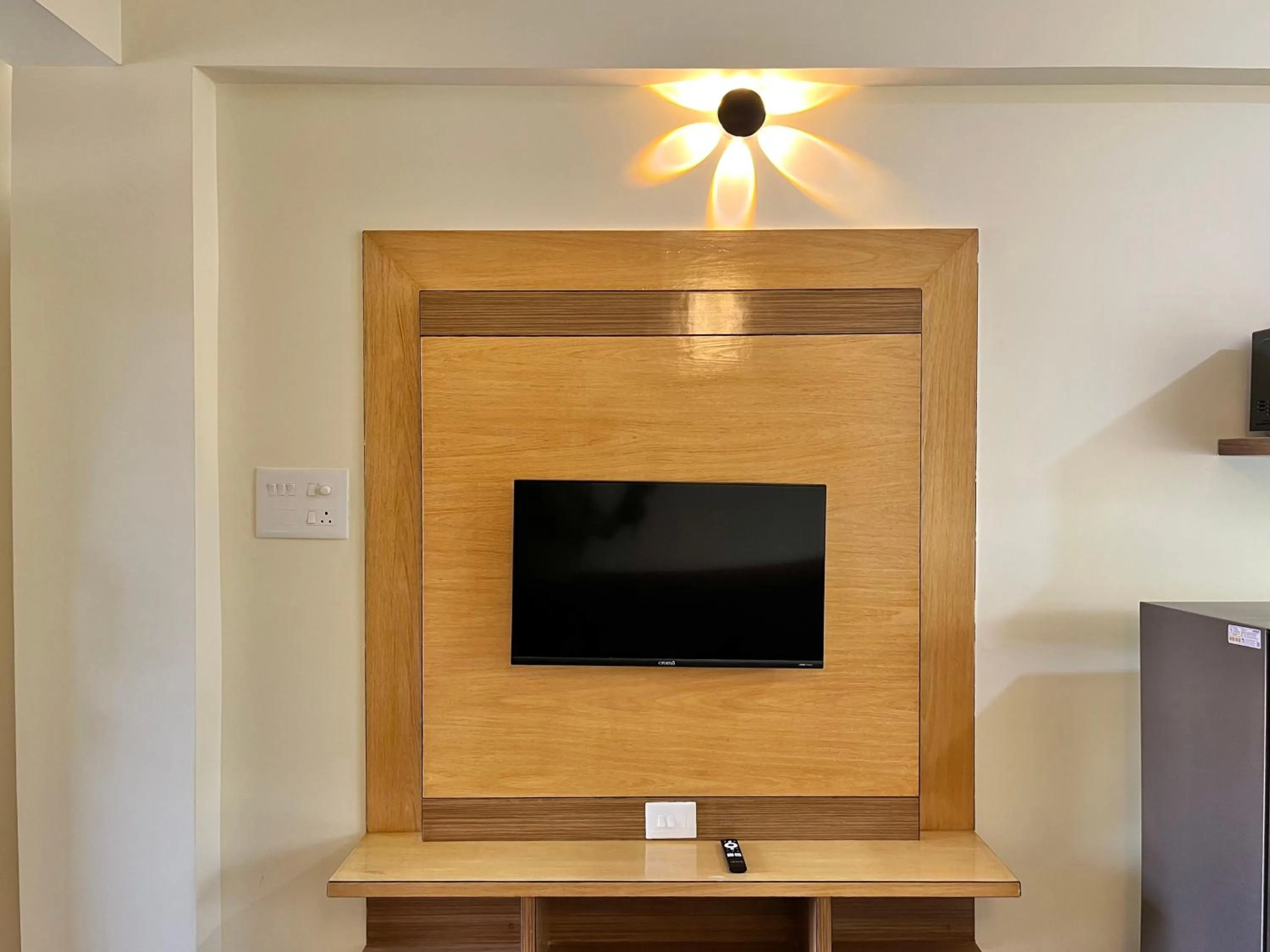 TV and multimedia in Lykke Suites- 2-min Drive to Colva Beach-By Goan Felicidade Hospitality PVT LTD