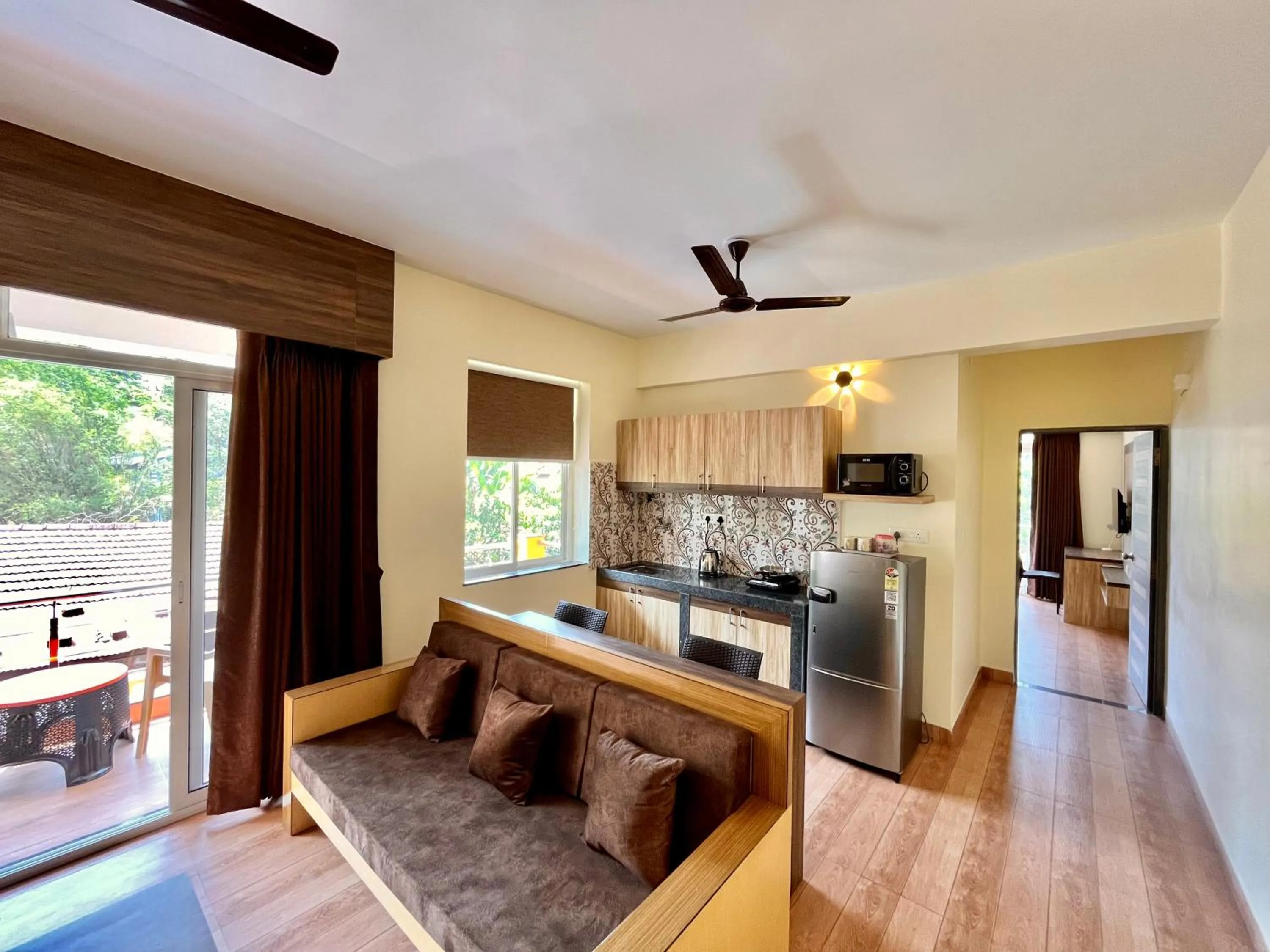 Living room in Lykke Suites- 2-min Drive to Colva Beach-By Goan Felicidade Hospitality PVT LTD