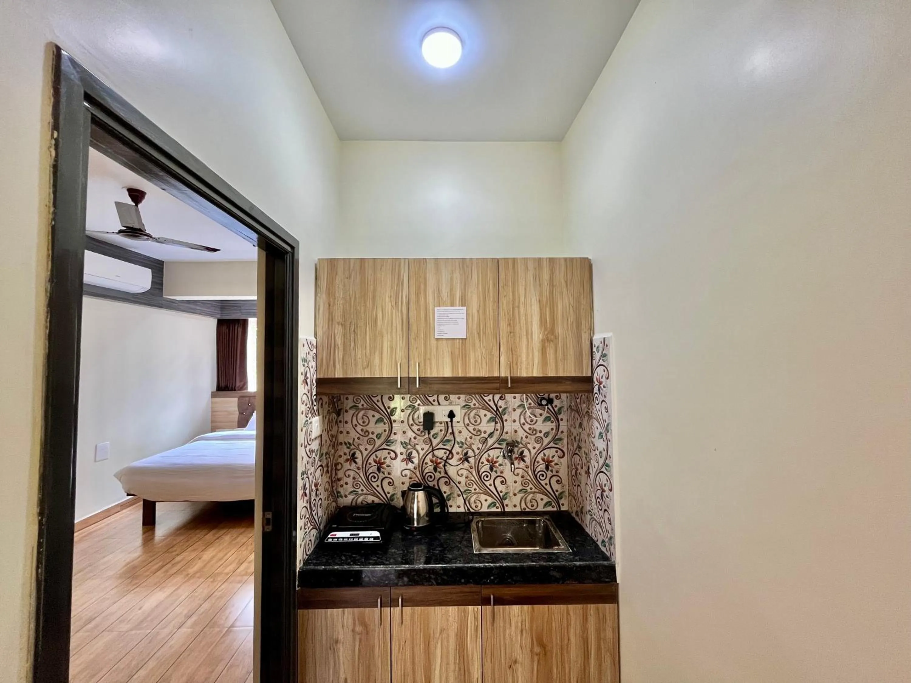 Kitchen or kitchenette, Bed in Lykke Suites- 2-min Drive to Colva Beach-By Goan Felicidade Hospitality PVT LTD
