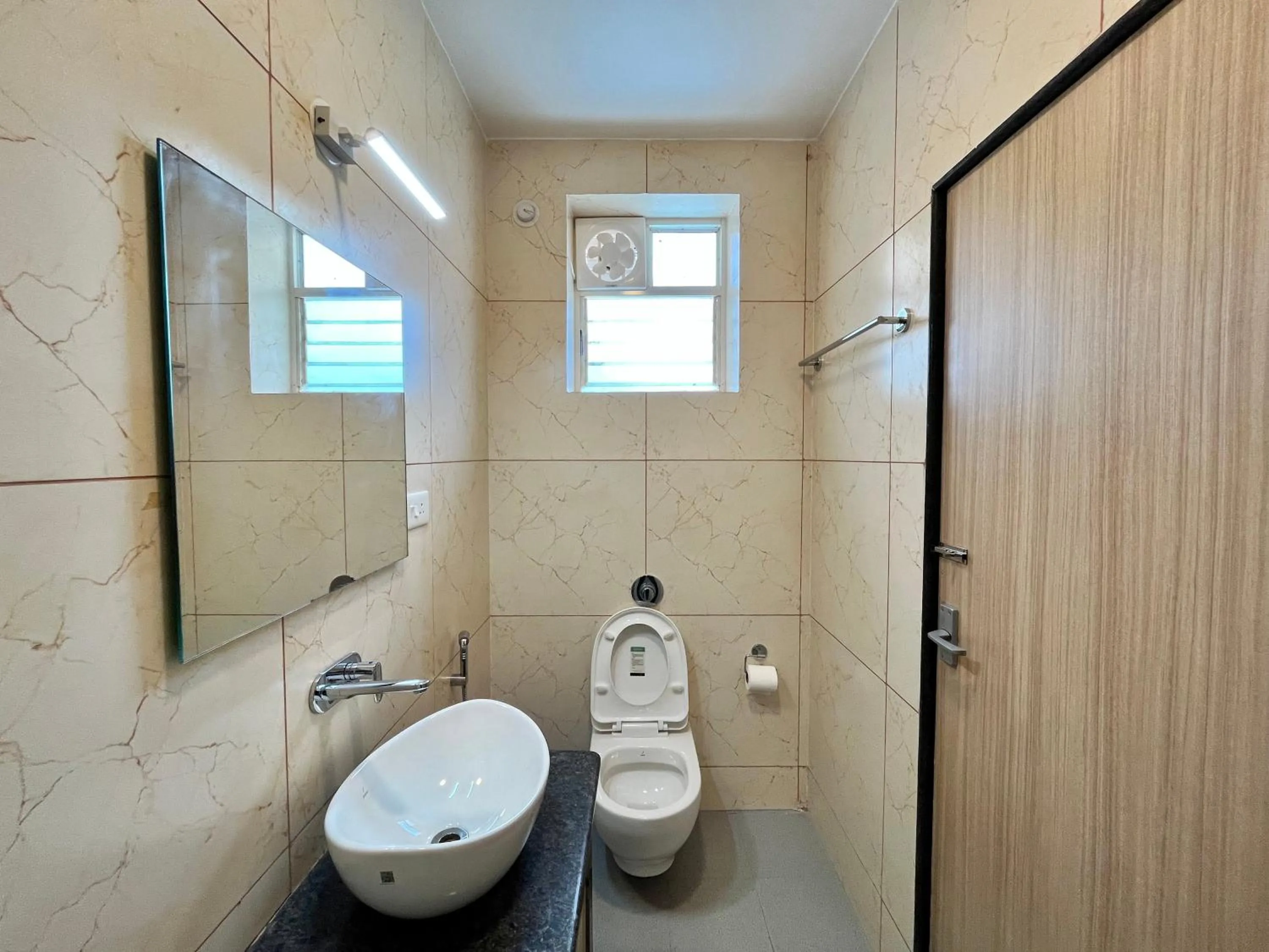 Toilet in Lykke Suites- 2-min Drive to Colva Beach-By Goan Felicidade Hospitality PVT LTD