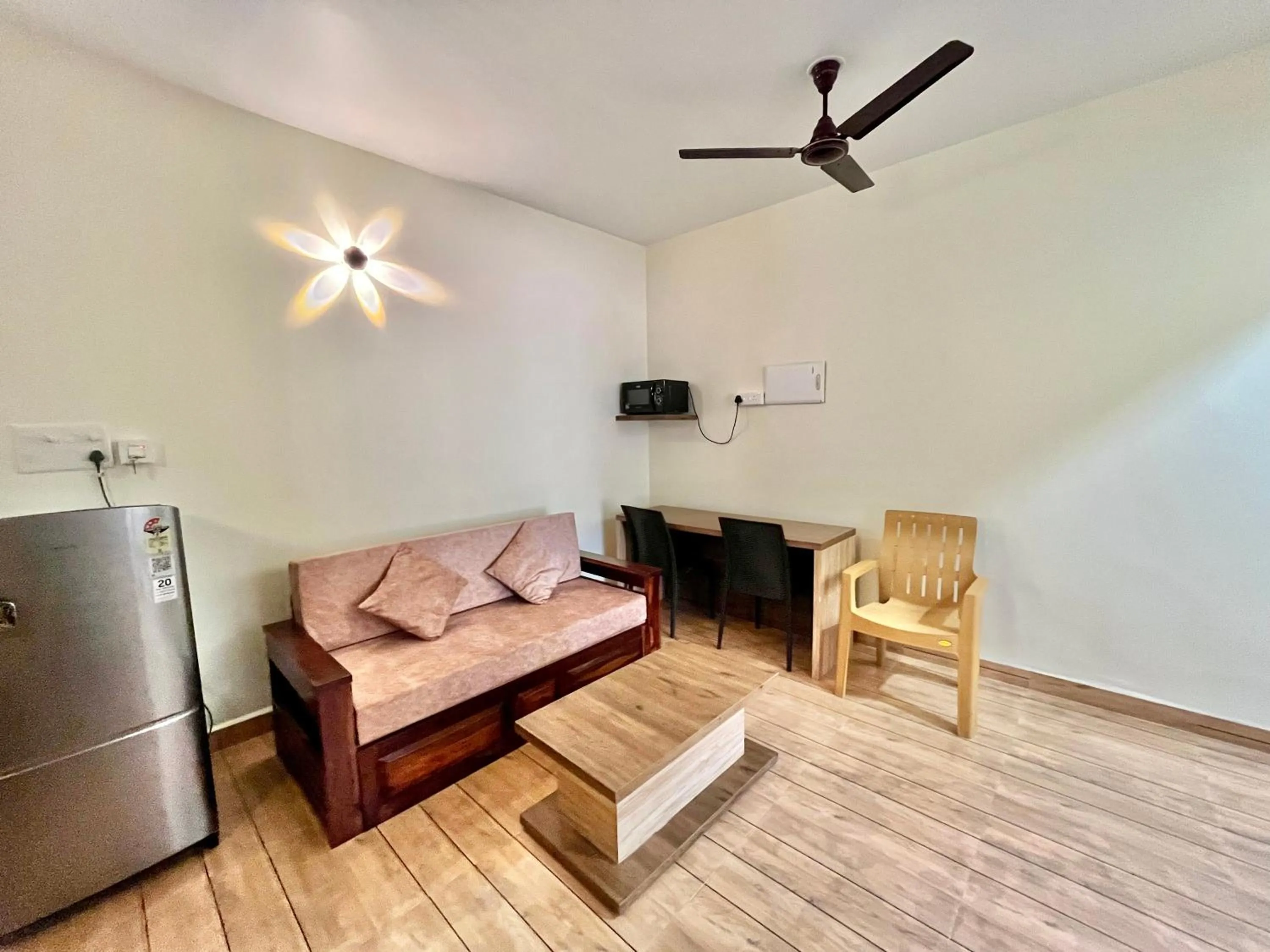 Living room in Lykke Suites- 2-min Drive to Colva Beach-By Goan Felicidade Hospitality PVT LTD