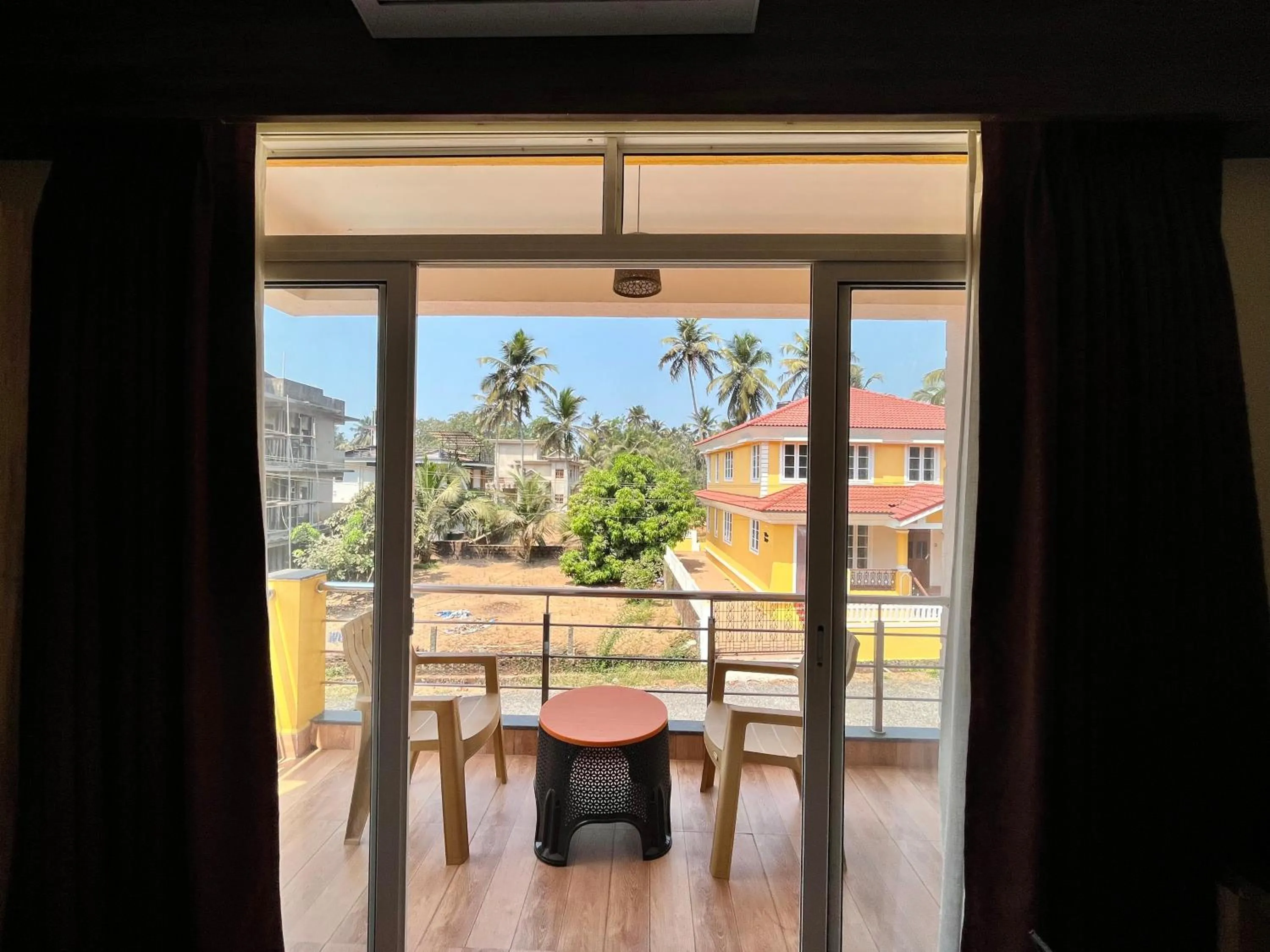 Balcony/Terrace in Lykke Suites- 2-min Drive to Colva Beach-By Goan Felicidade Hospitality PVT LTD