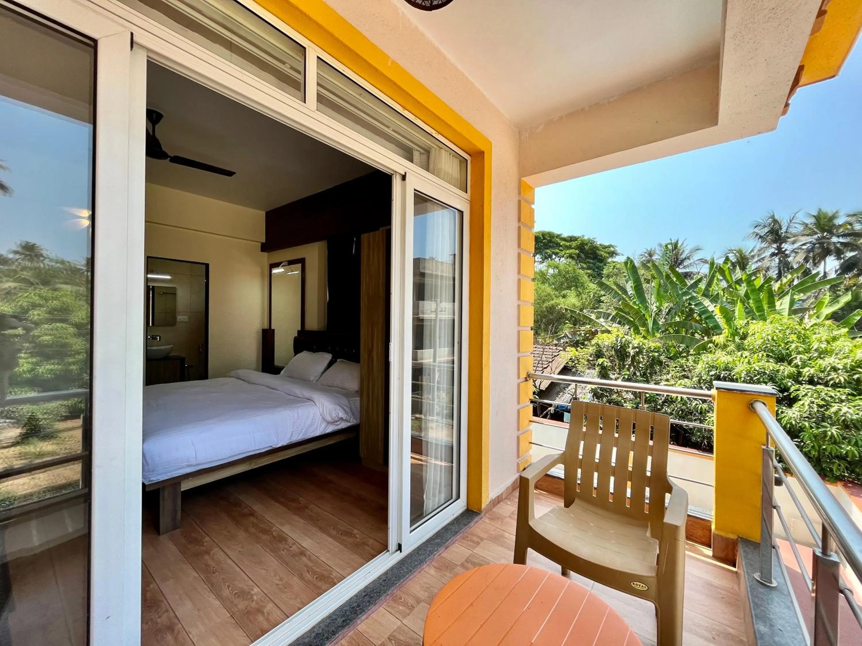 Balcony/Terrace, Bed in Lykke Suites- 2-min Drive to Colva Beach-By Goan Felicidade Hospitality PVT LTD