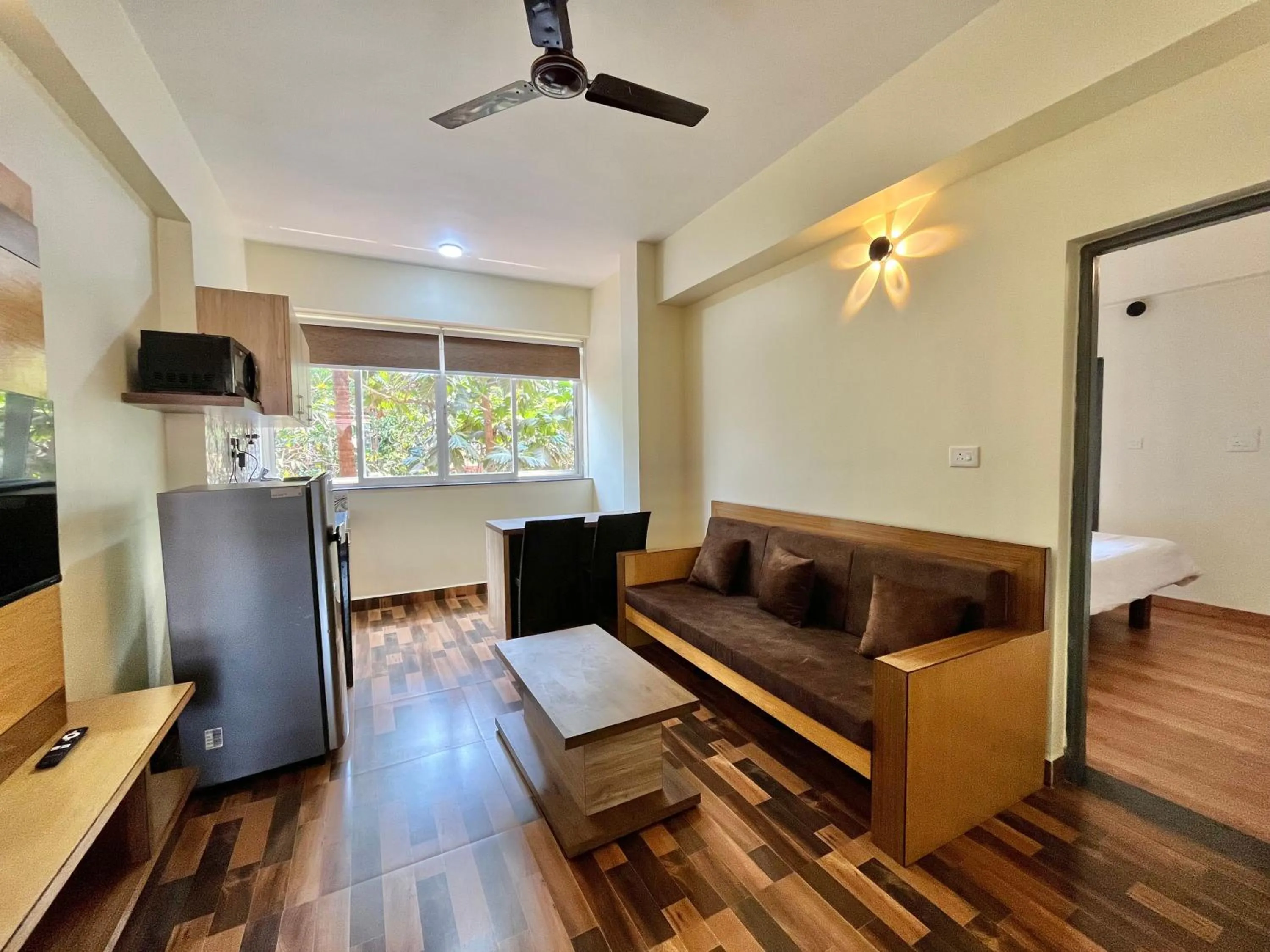 TV and multimedia in Lykke Suites- 2-min Drive to Colva Beach-By Goan Felicidade Hospitality PVT LTD