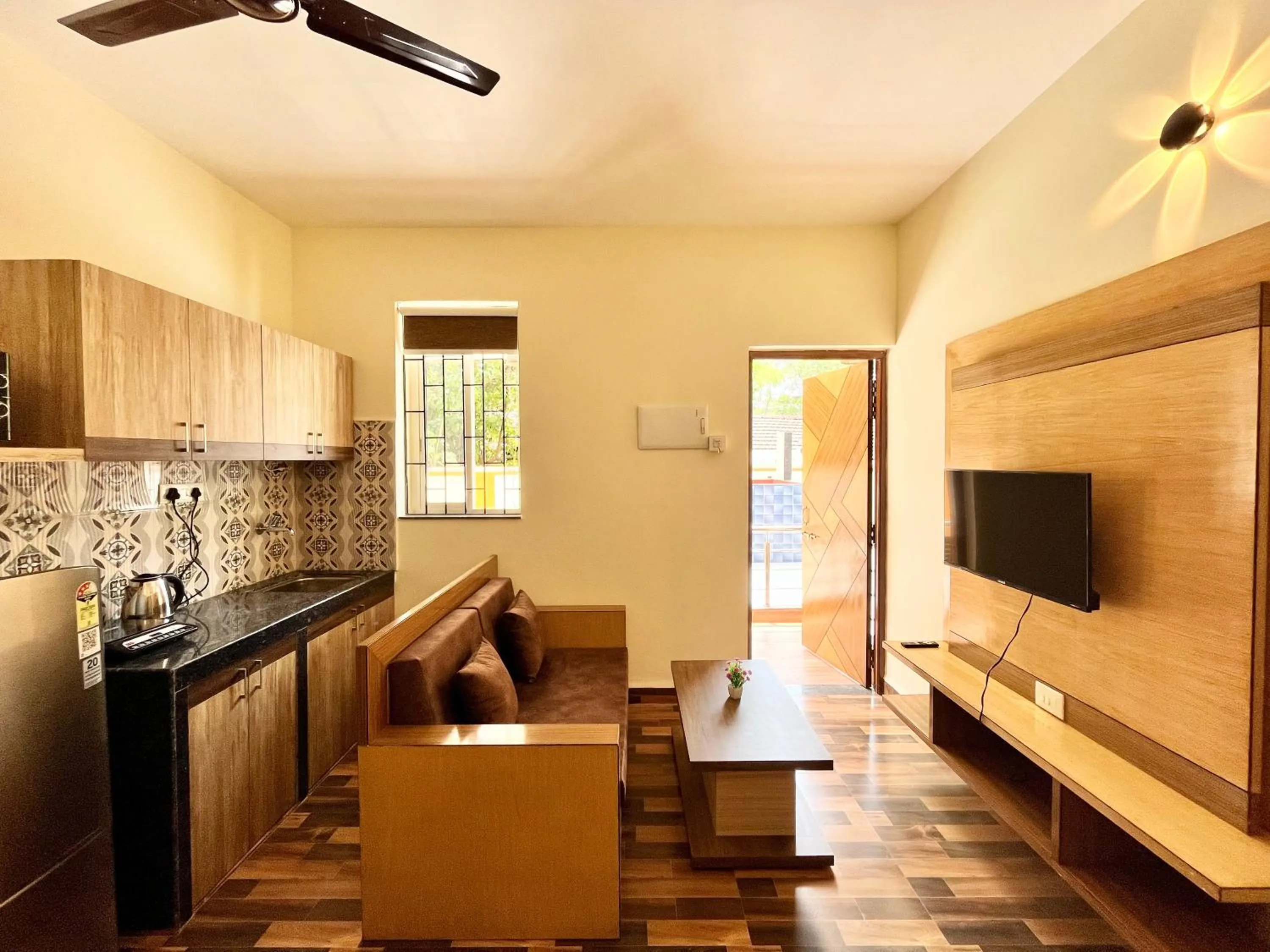Living room in Lykke Suites- 2-min Drive to Colva Beach-By Goan Felicidade Hospitality PVT LTD