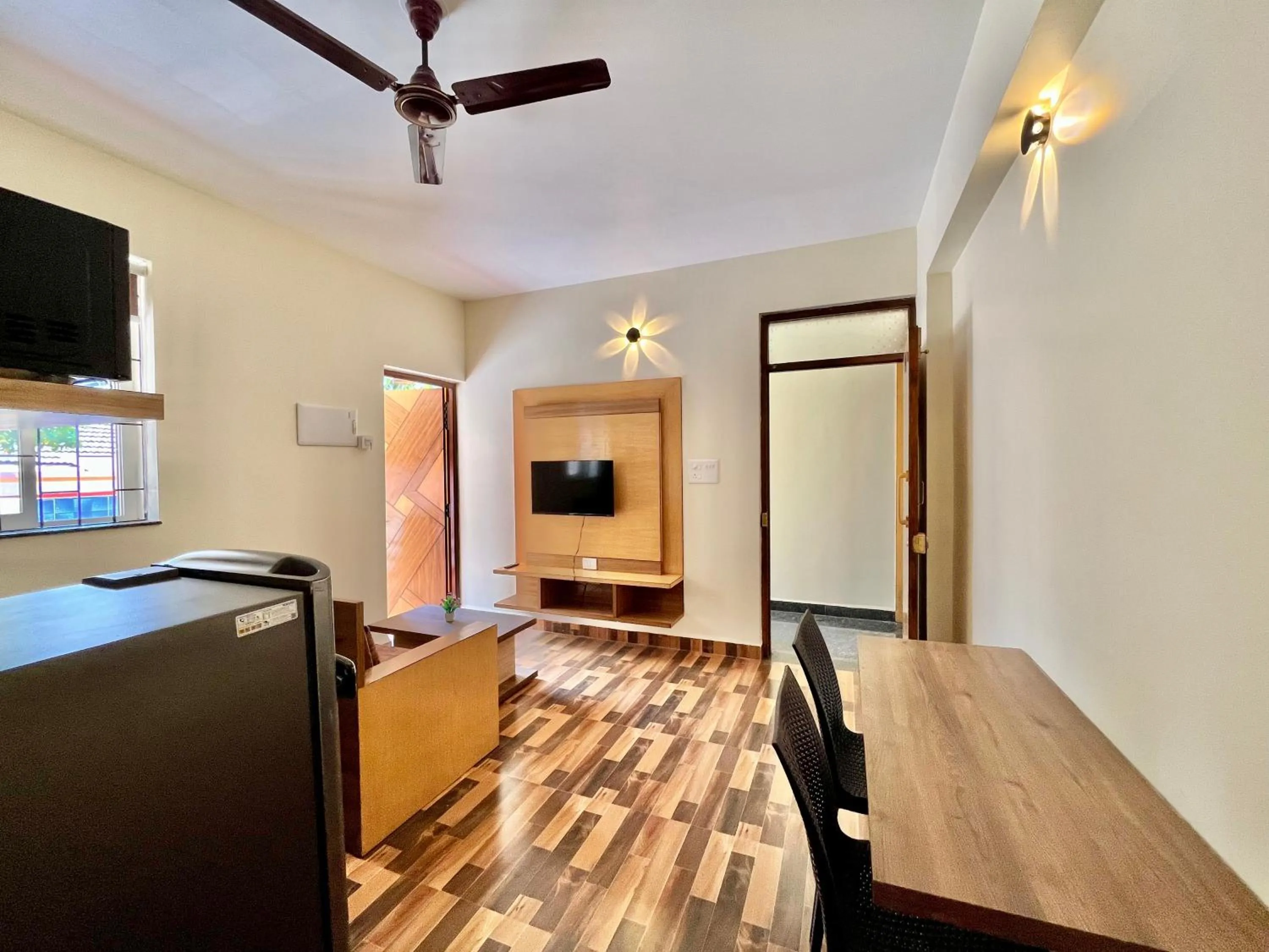 TV and multimedia in Lykke Suites- 2-min Drive to Colva Beach-By Goan Felicidade Hospitality PVT LTD