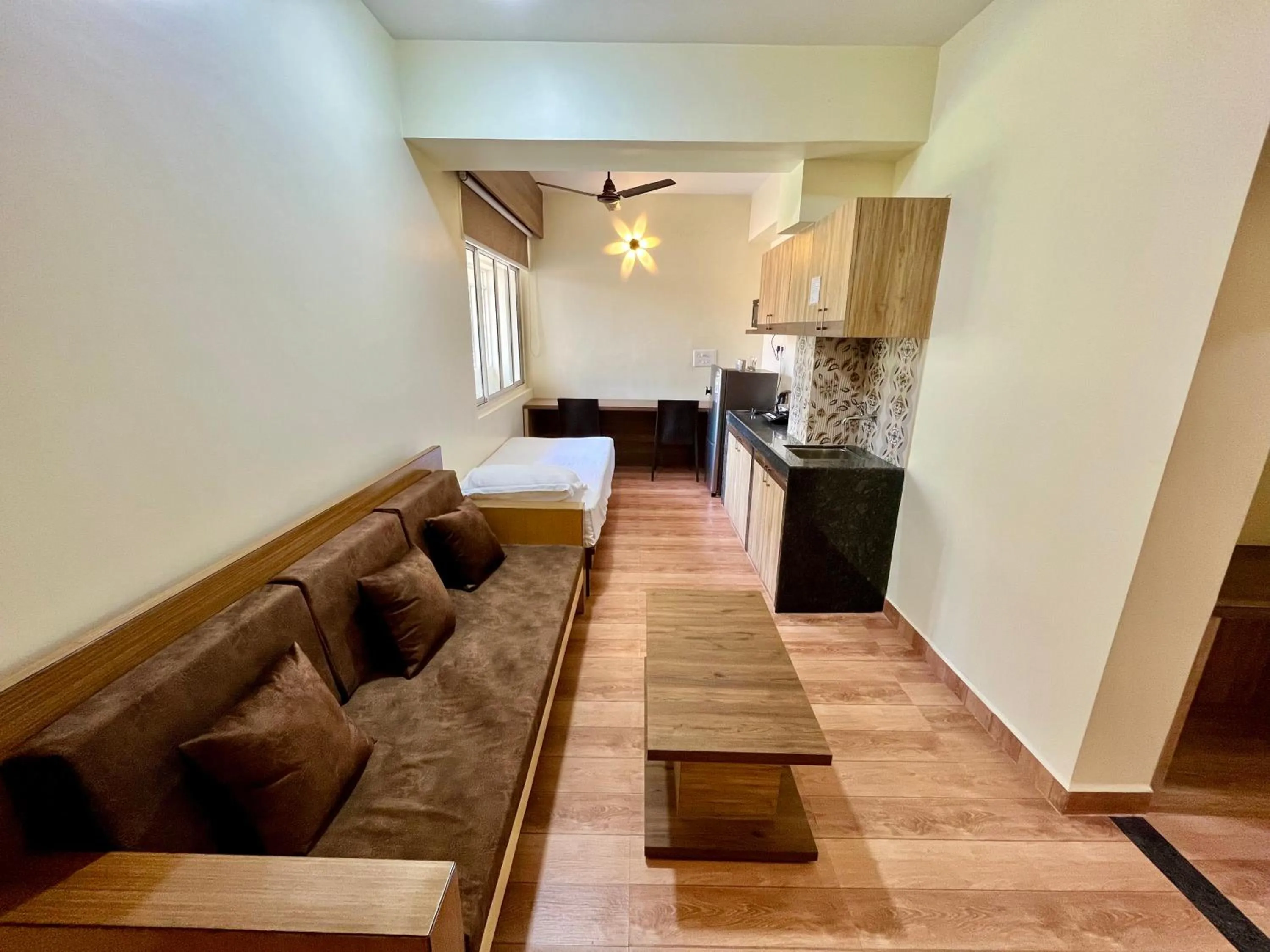 Kitchen or kitchenette in Lykke Suites- 2-min Drive to Colva Beach-By Goan Felicidade Hospitality PVT LTD