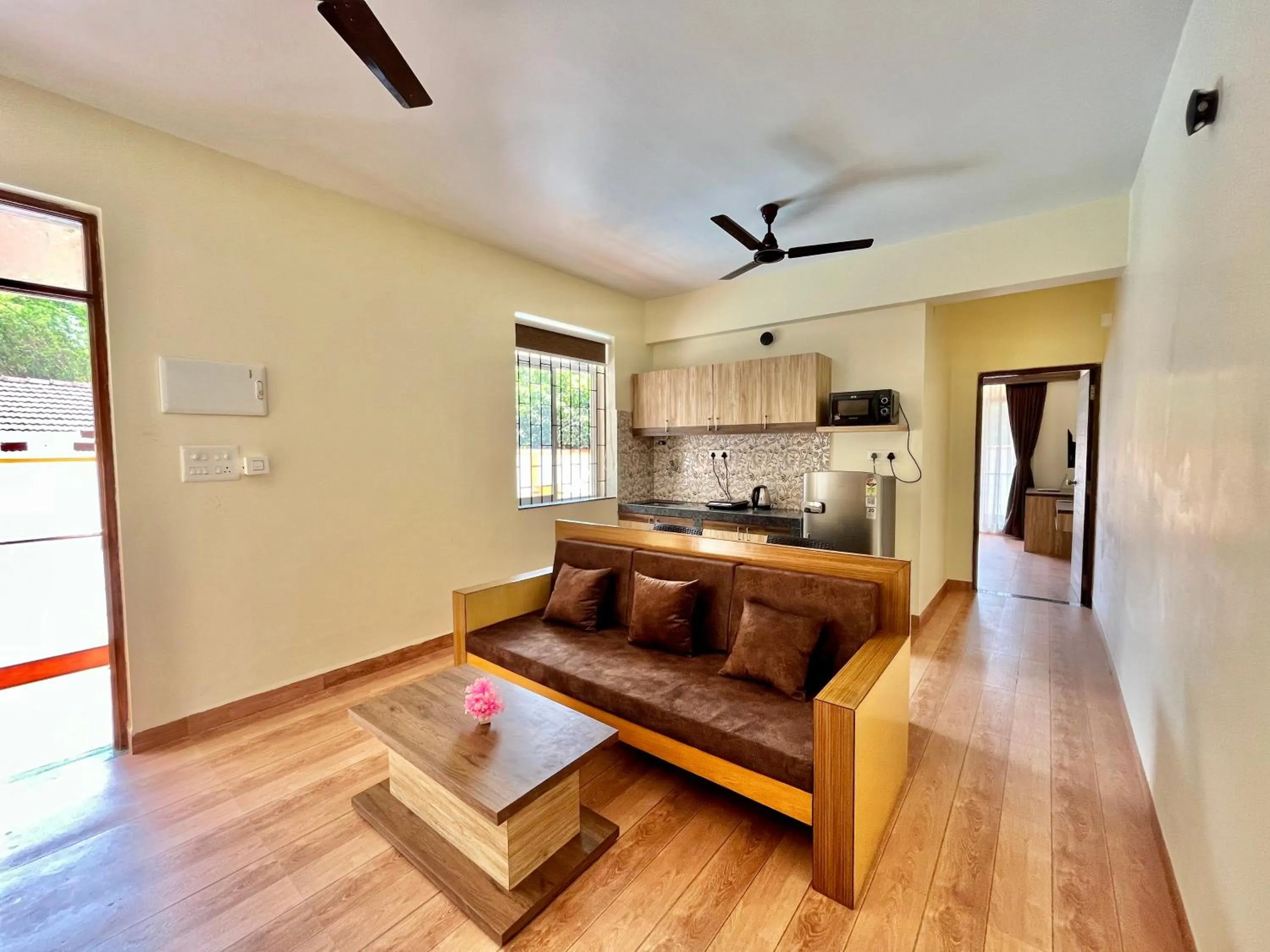 Living room in Lykke Suites- 2-min Drive to Colva Beach-By Goan Felicidade Hospitality PVT LTD