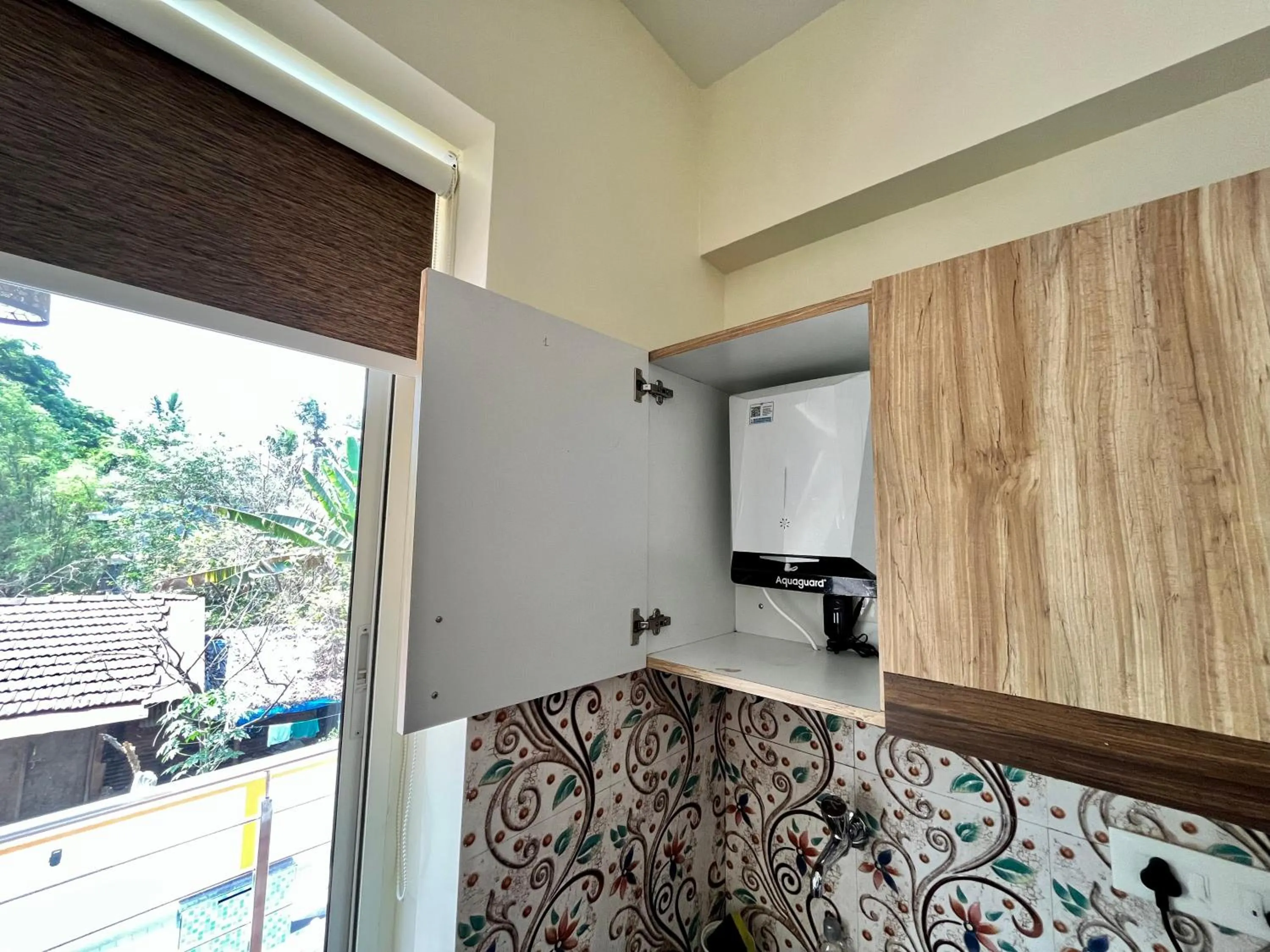 Kitchen or kitchenette in Lykke Suites- 2-min Drive to Colva Beach-By Goan Felicidade Hospitality PVT LTD