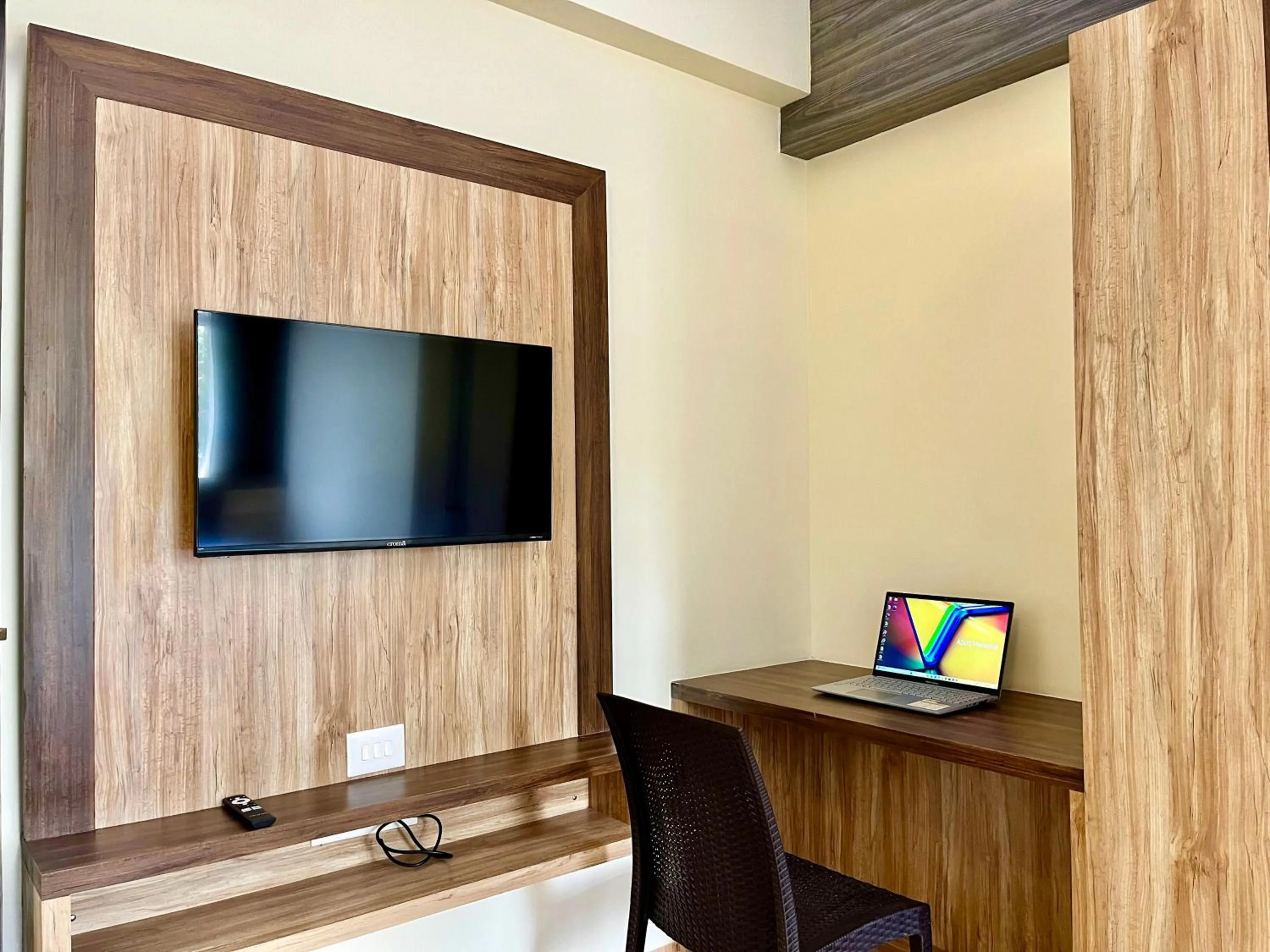 TV and multimedia in Lykke Suites- 2-min Drive to Colva Beach-By Goan Felicidade Hospitality PVT LTD