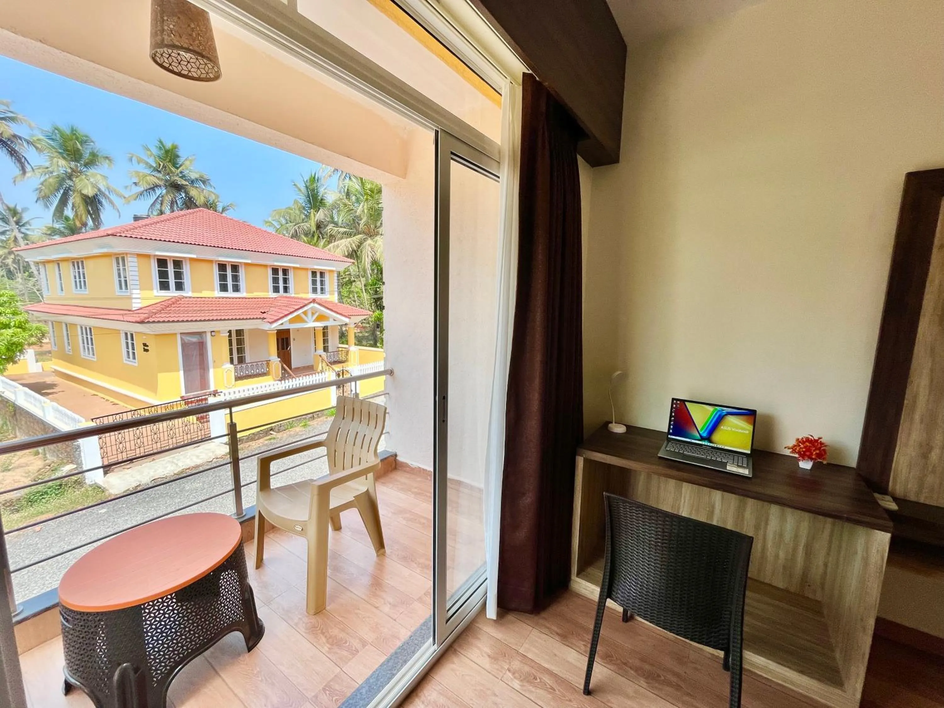 Balcony/Terrace in Lykke Suites- 2-min Drive to Colva Beach-By Goan Felicidade Hospitality PVT LTD