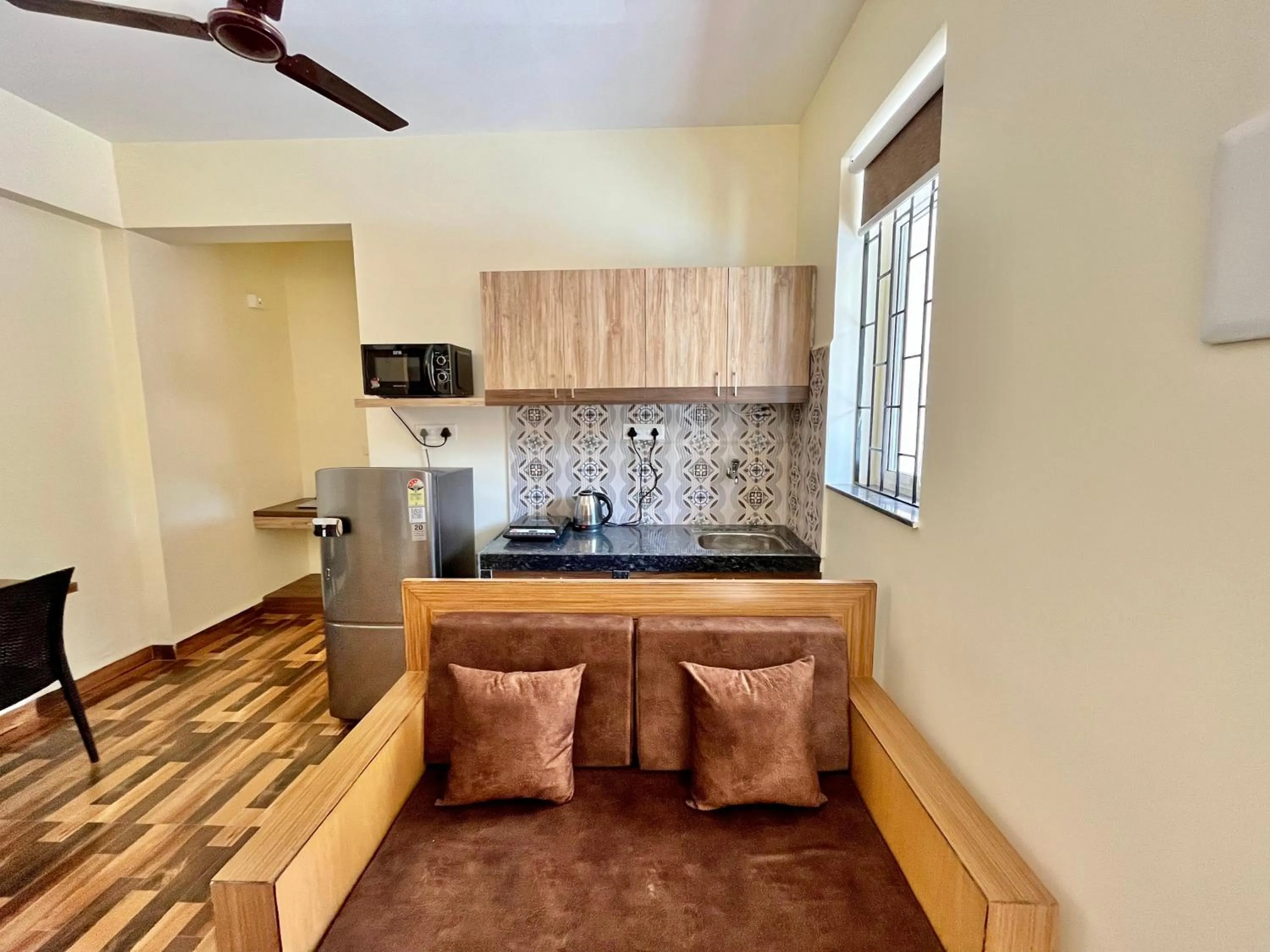 Kitchen or kitchenette in Lykke Suites- 2-min Drive to Colva Beach-By Goan Felicidade Hospitality PVT LTD