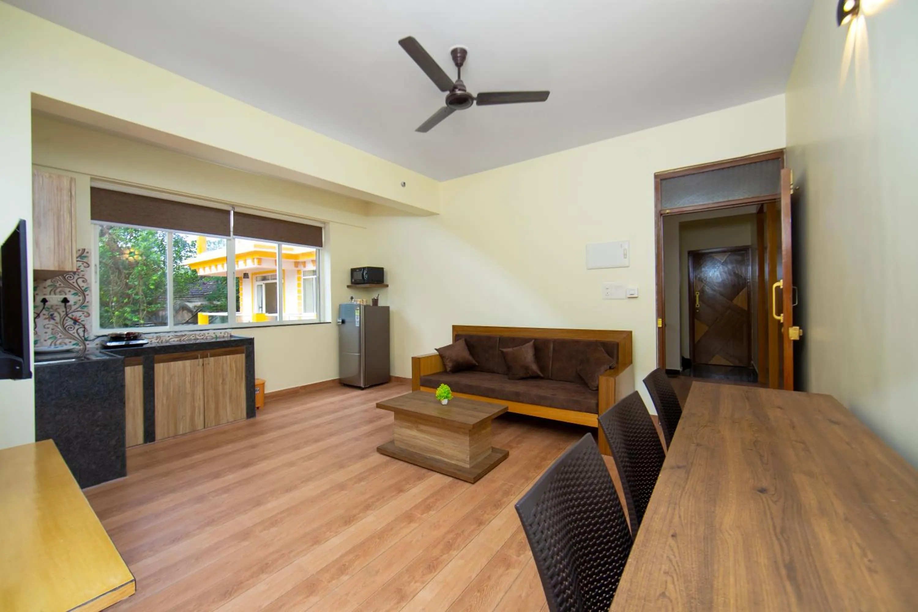 Kitchen or kitchenette in Lykke Suites- 2-min Drive to Colva Beach-By Goan Felicidade Hospitality PVT LTD