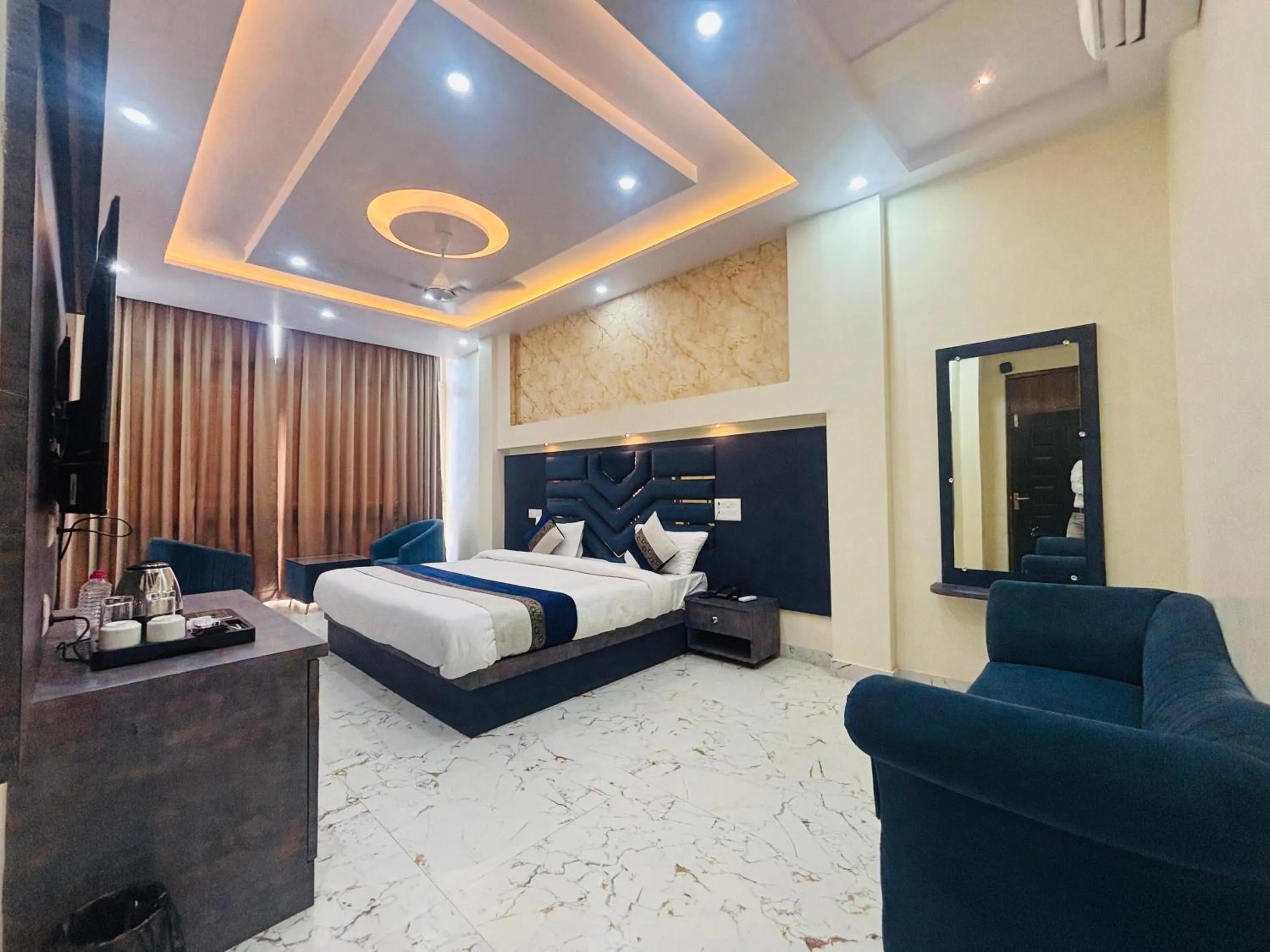 Bed in KashVi Hotels