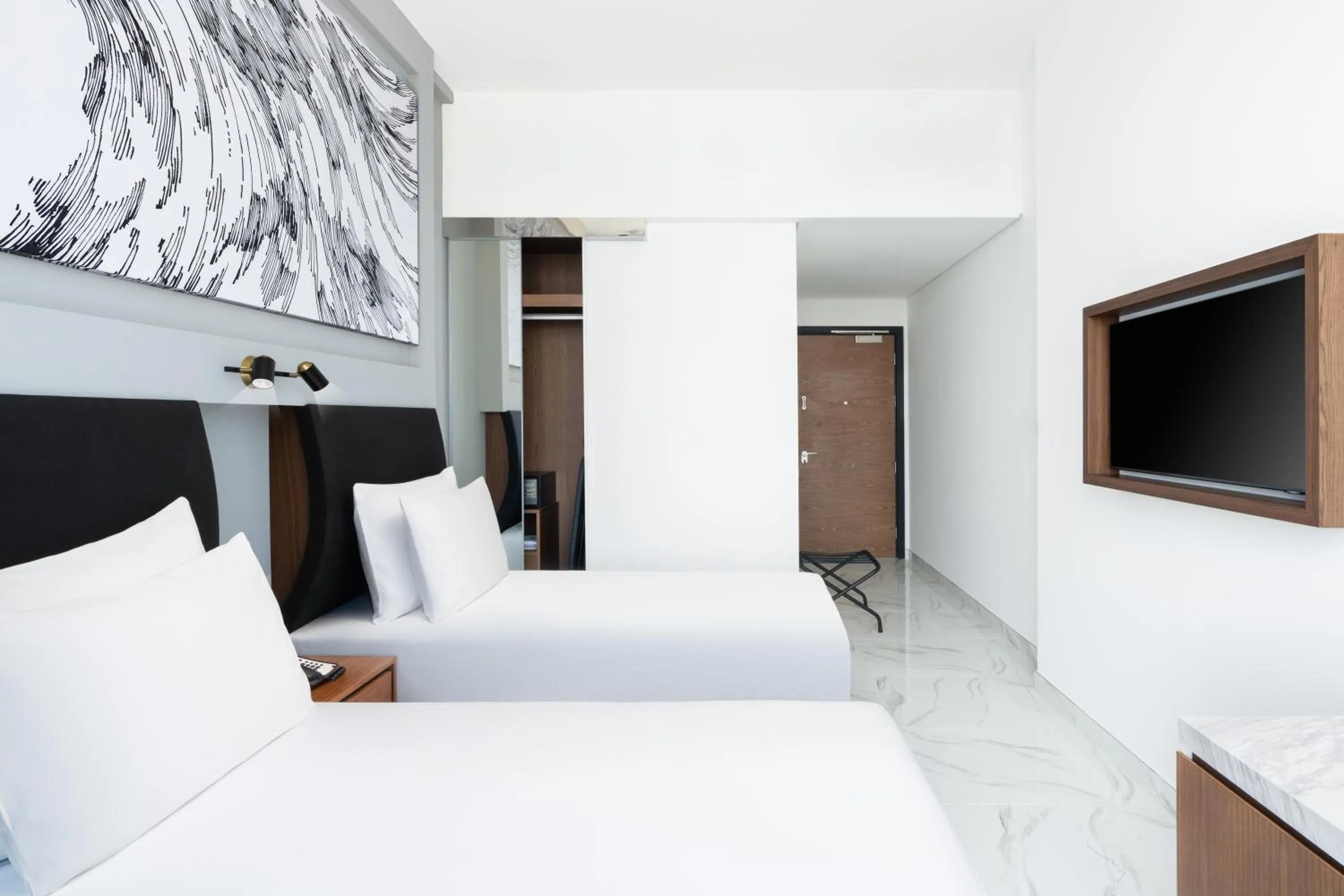 Photo of the whole room, Bed in Holiday Inn Dubai Village Circle by IHG