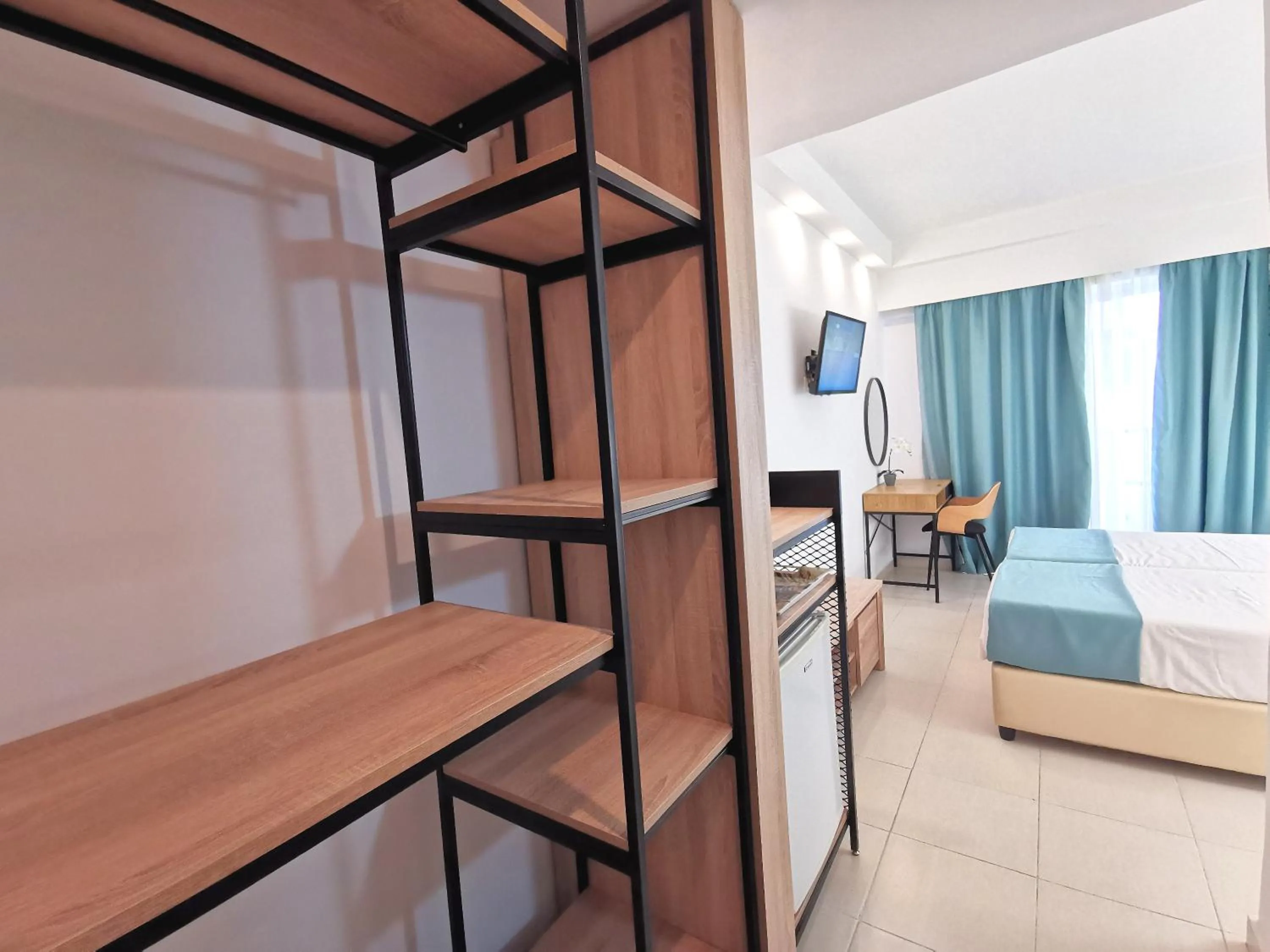 Photo of the whole room, Bed in Artemis Studios