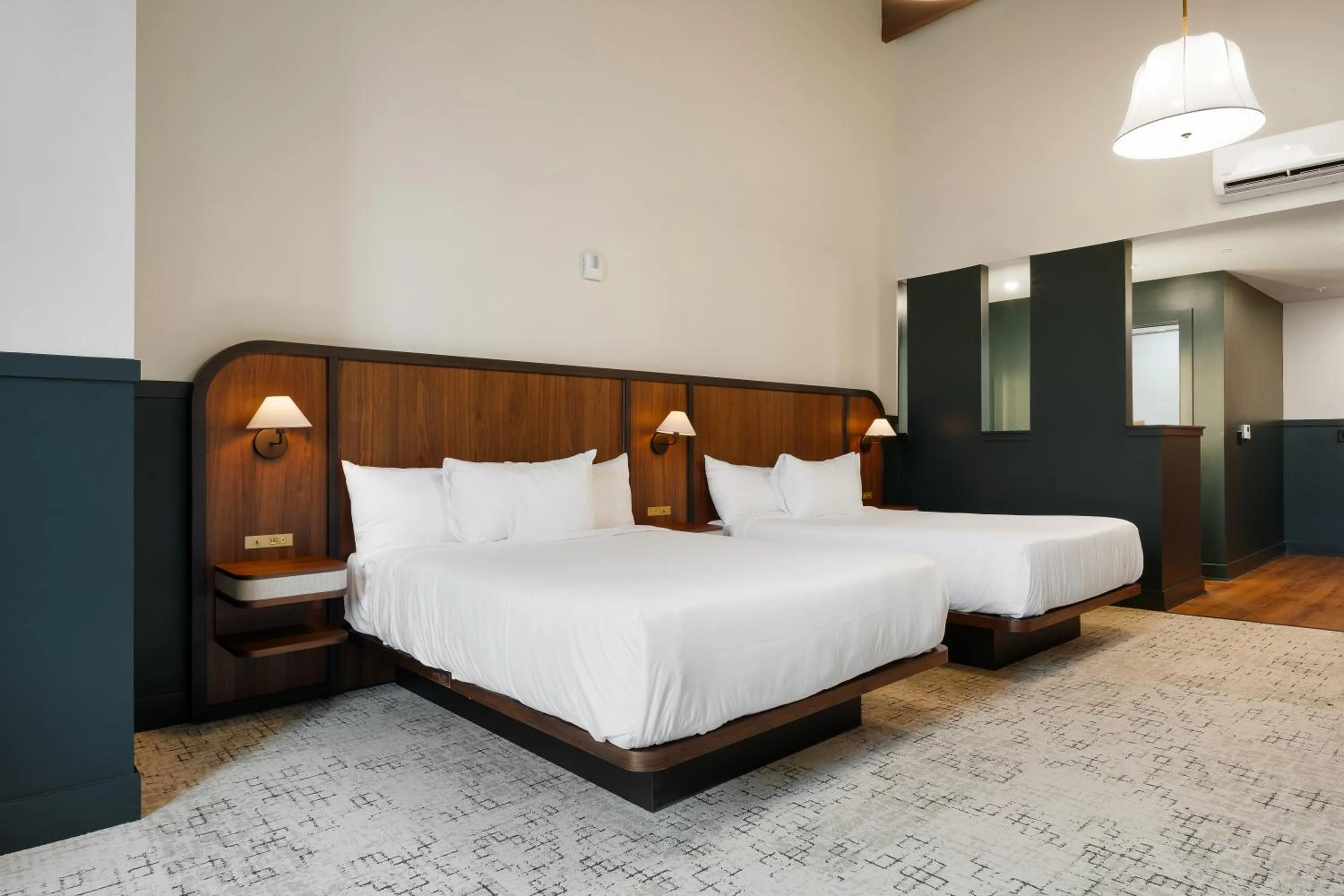 Bed in The Delegate Hotel