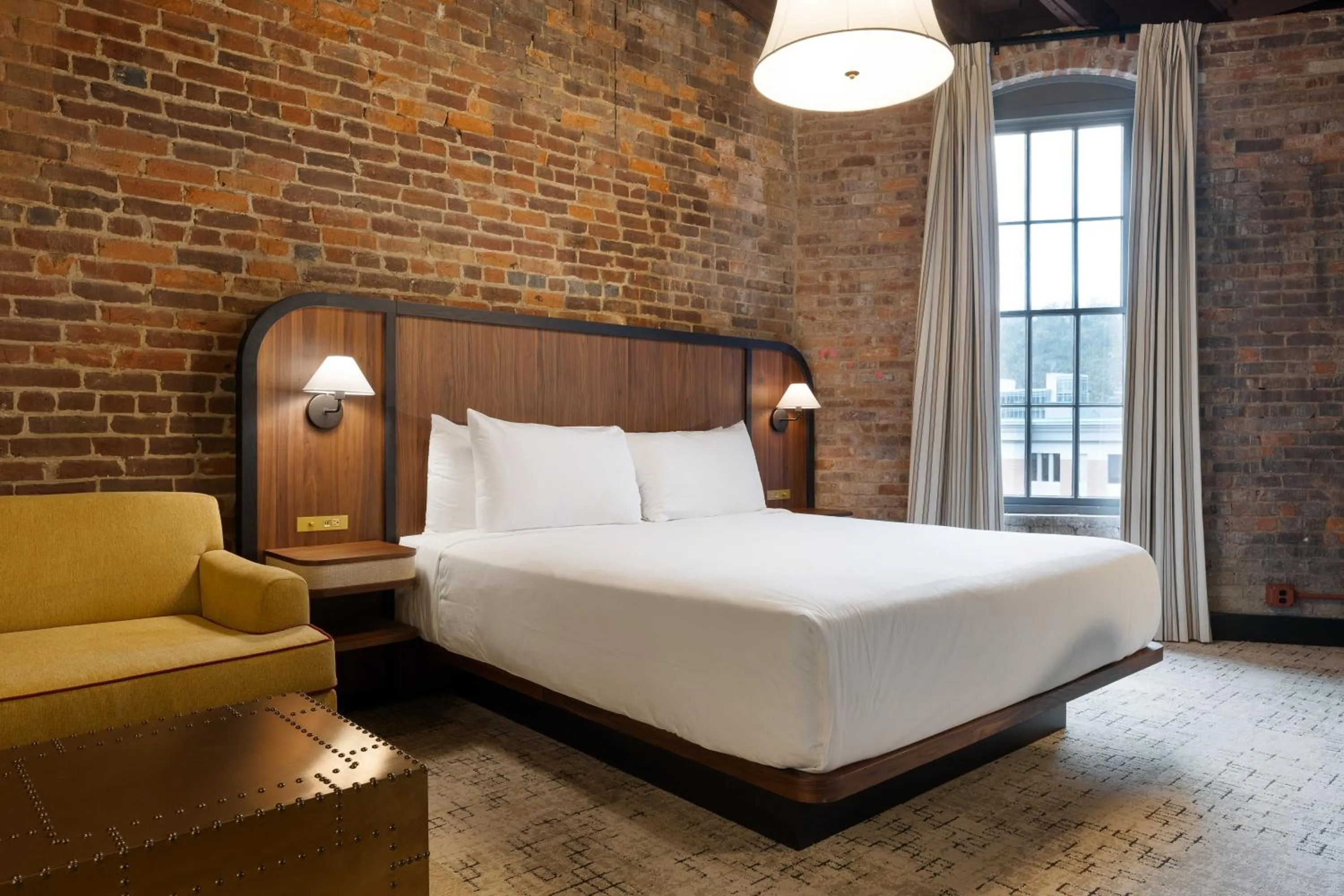 Bed in The Delegate Hotel