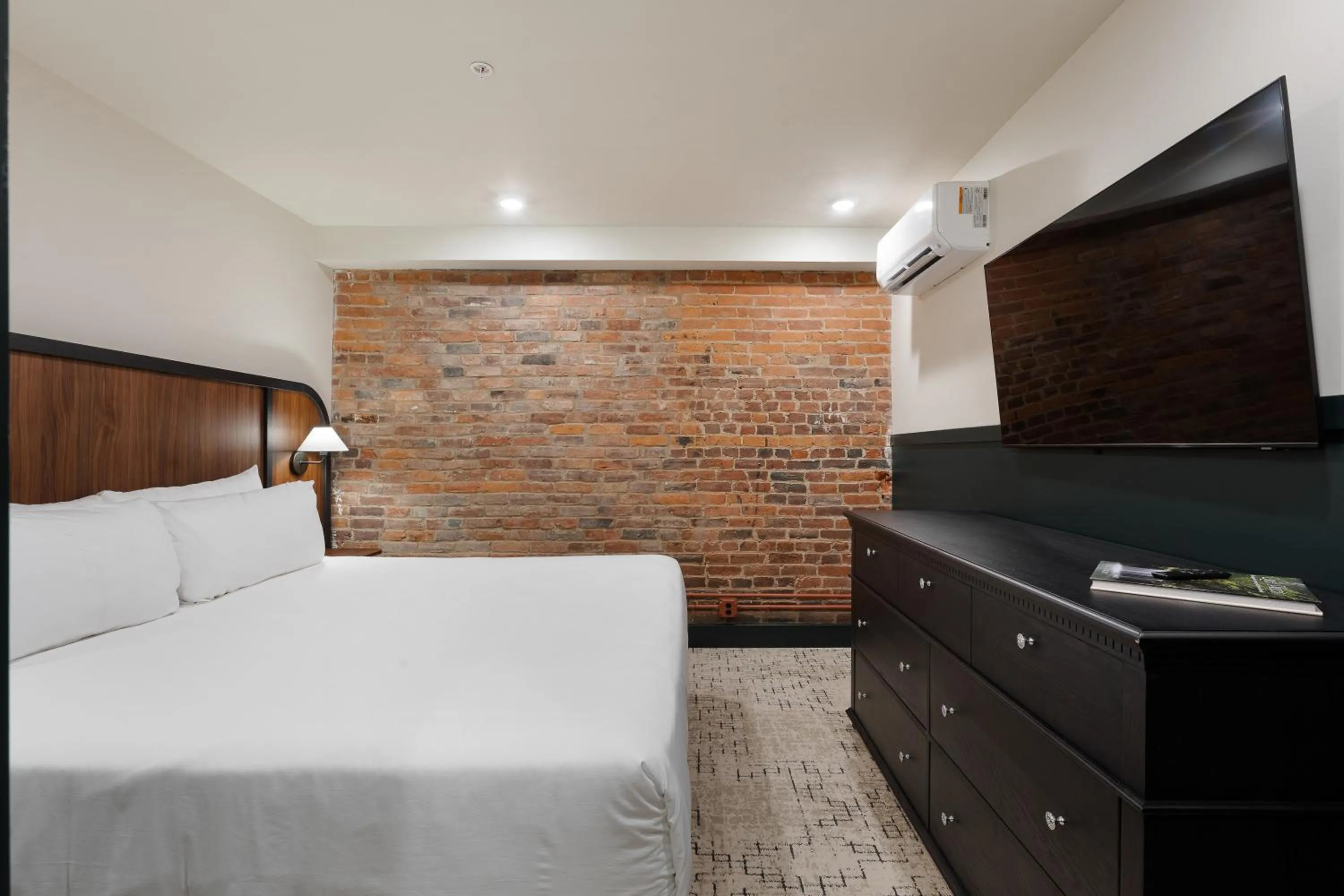 Bed in The Delegate Hotel