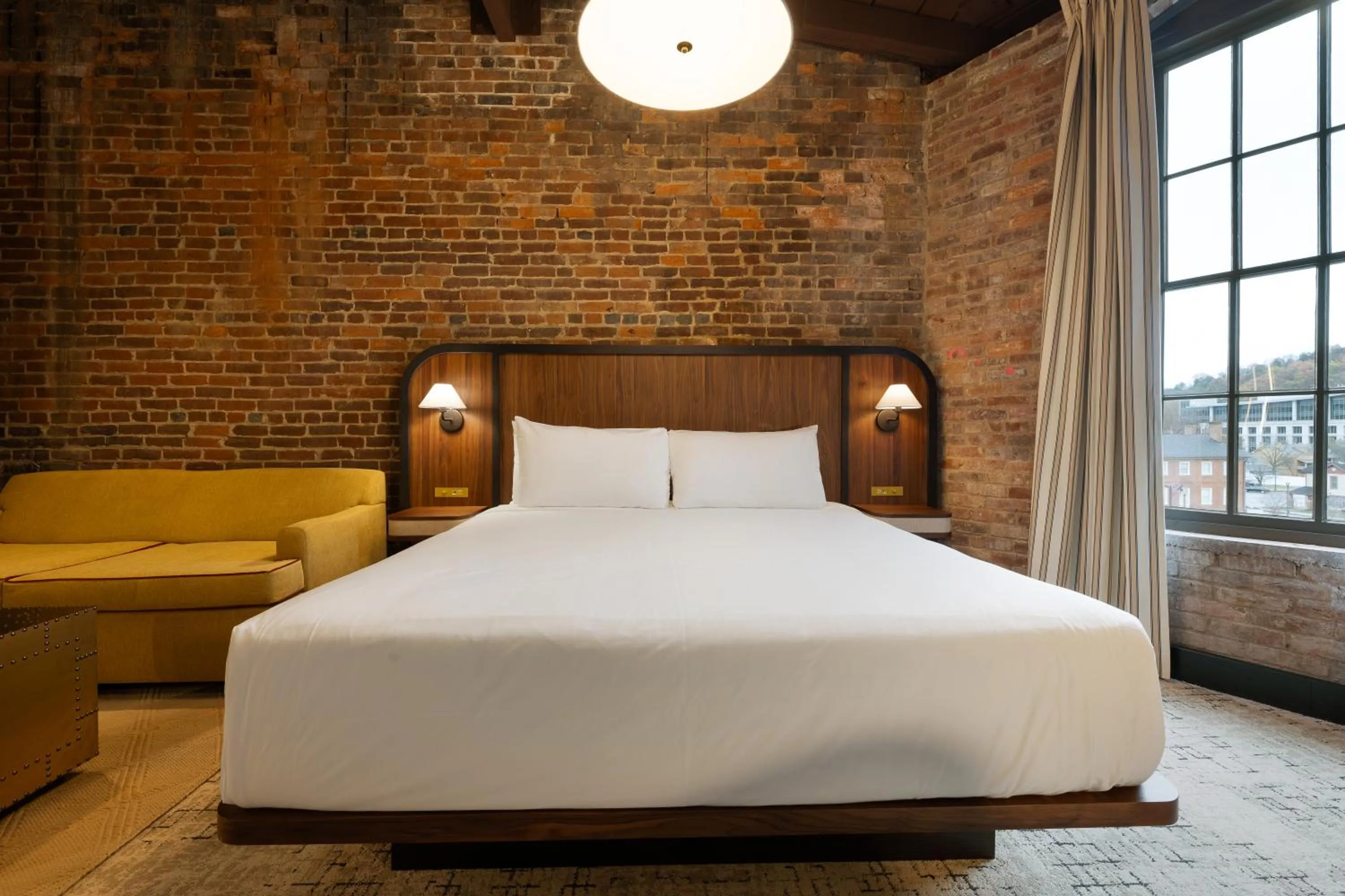 Bed in The Delegate Hotel