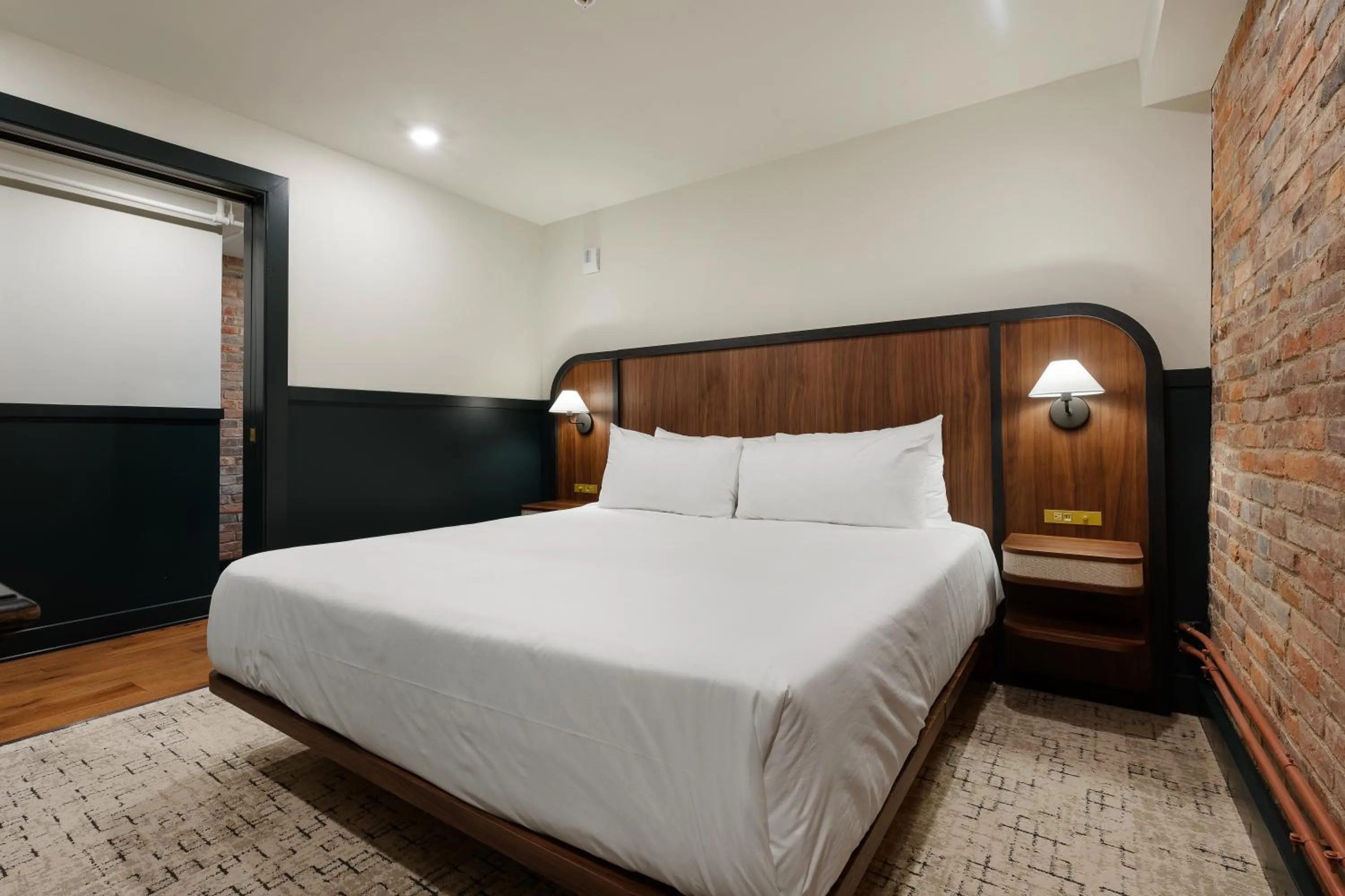 Bed in The Delegate Hotel