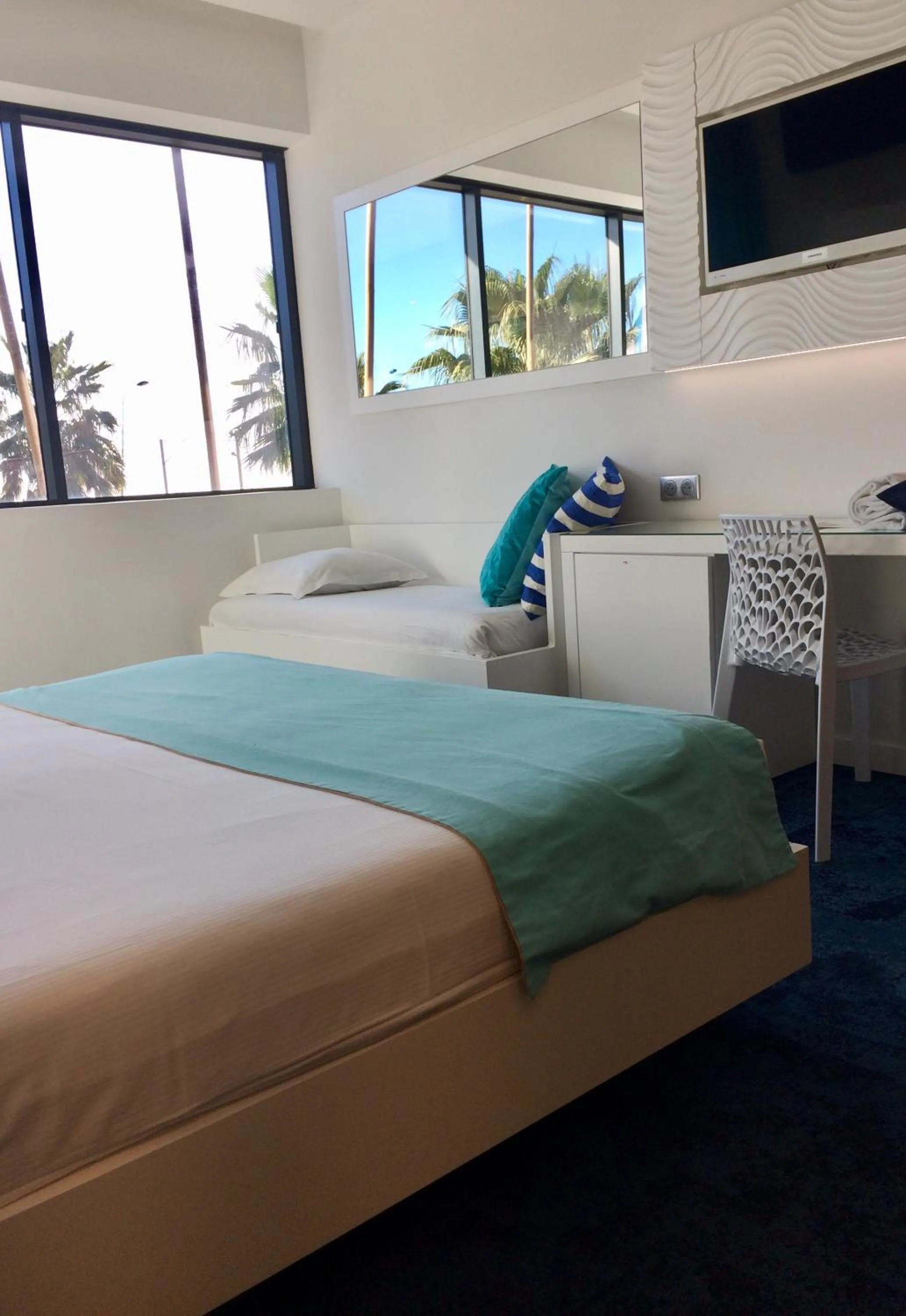 Bed in SoBlue Hôtel