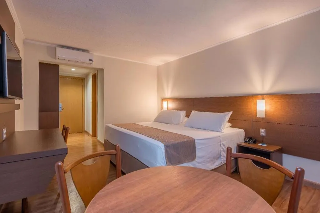 Bed in Hotel Caiuá Cascavel