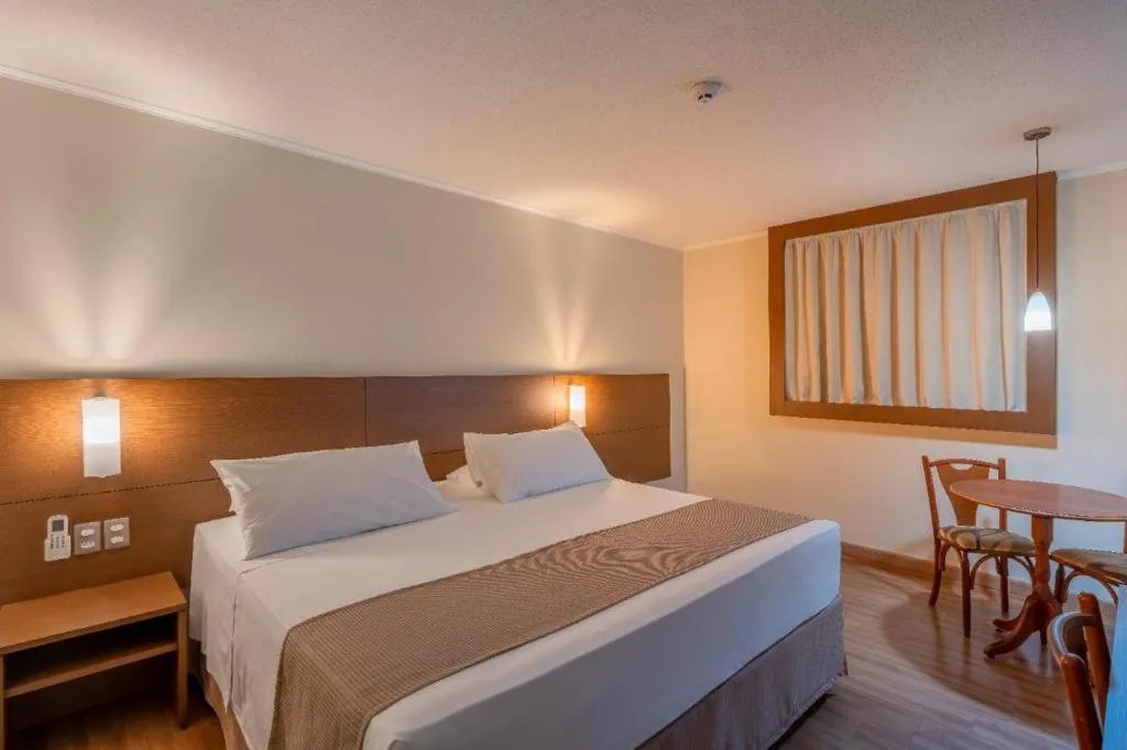 Bed in Hotel Caiuá Cascavel