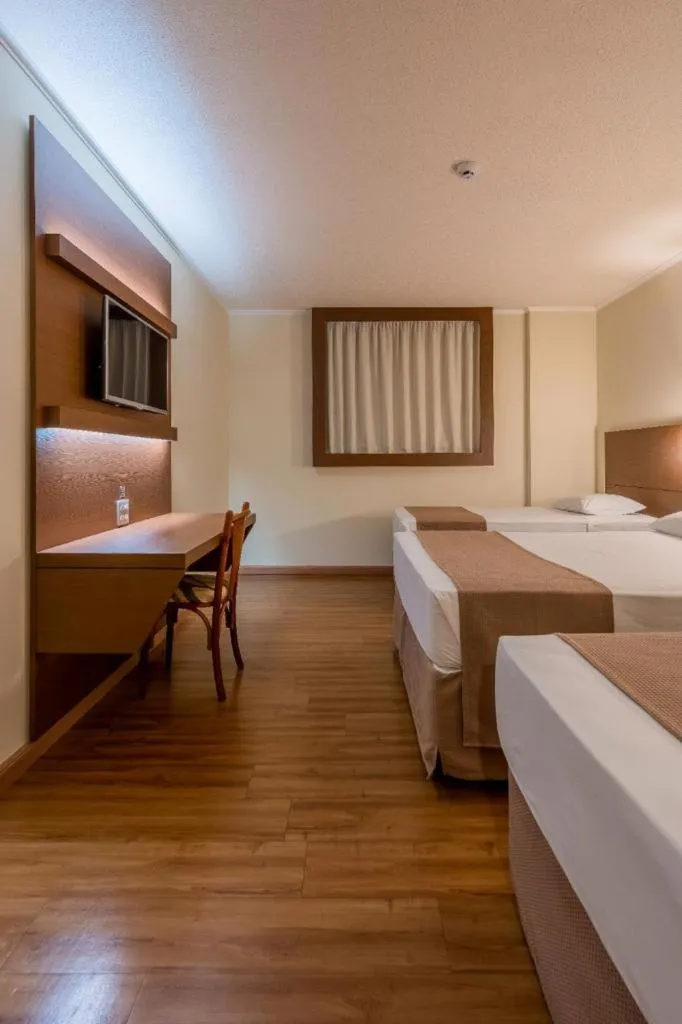 Bed in Hotel Caiuá Cascavel