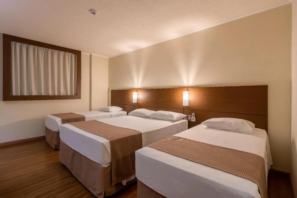 Bed in Hotel Caiuá Cascavel