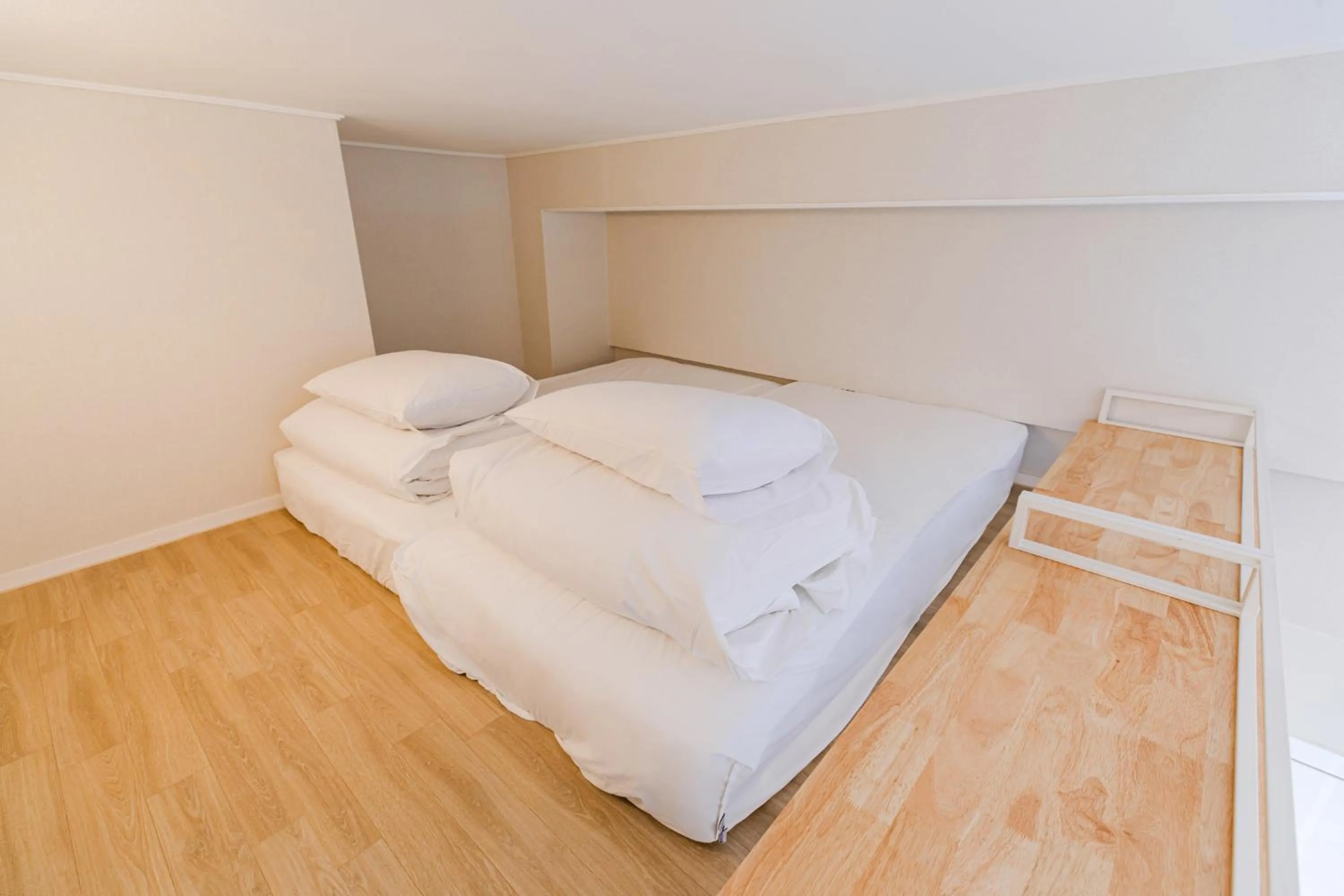 Bed in Blue Ocean Hotel 3