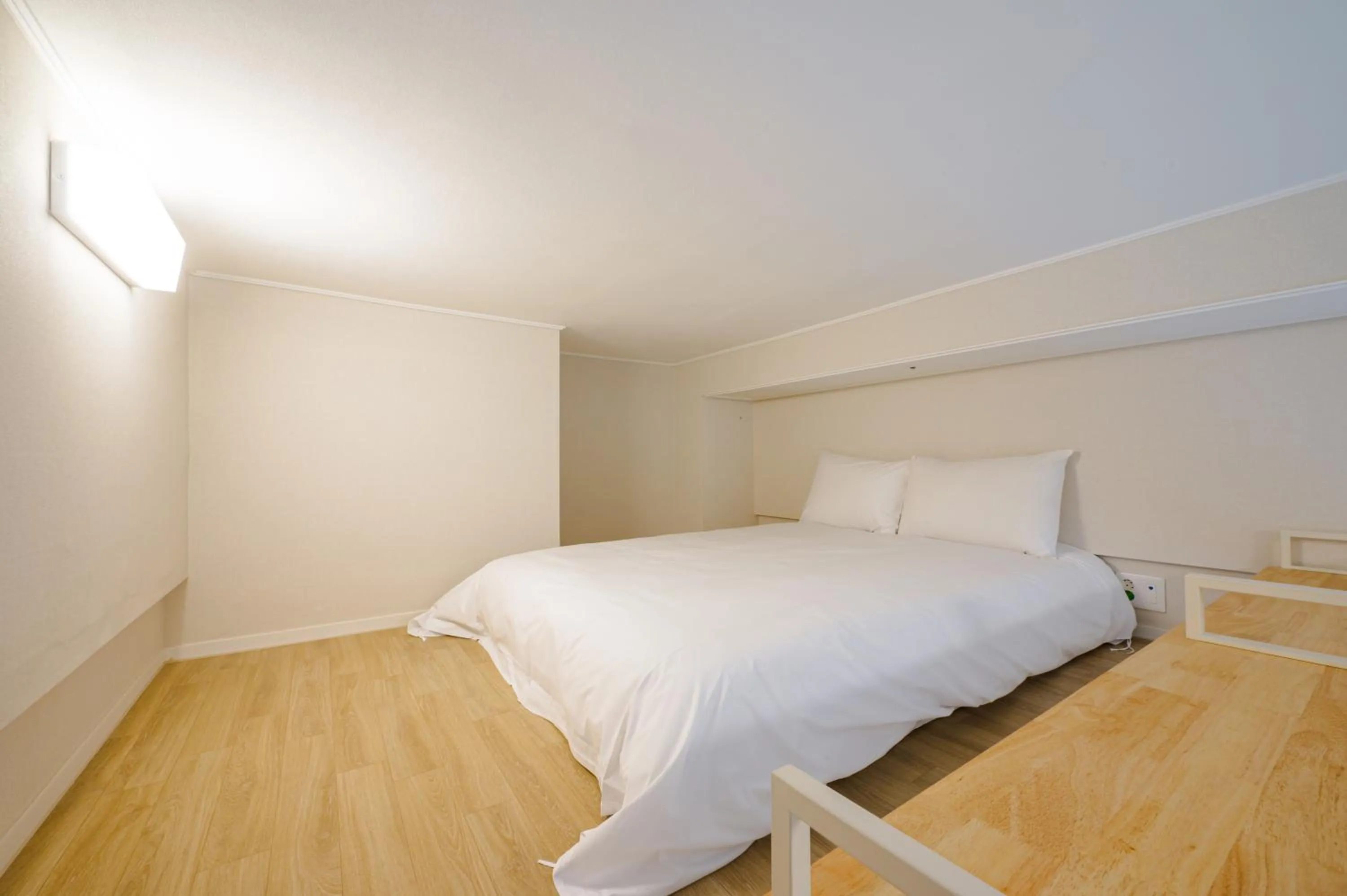 Bed in Blue Ocean Hotel 3