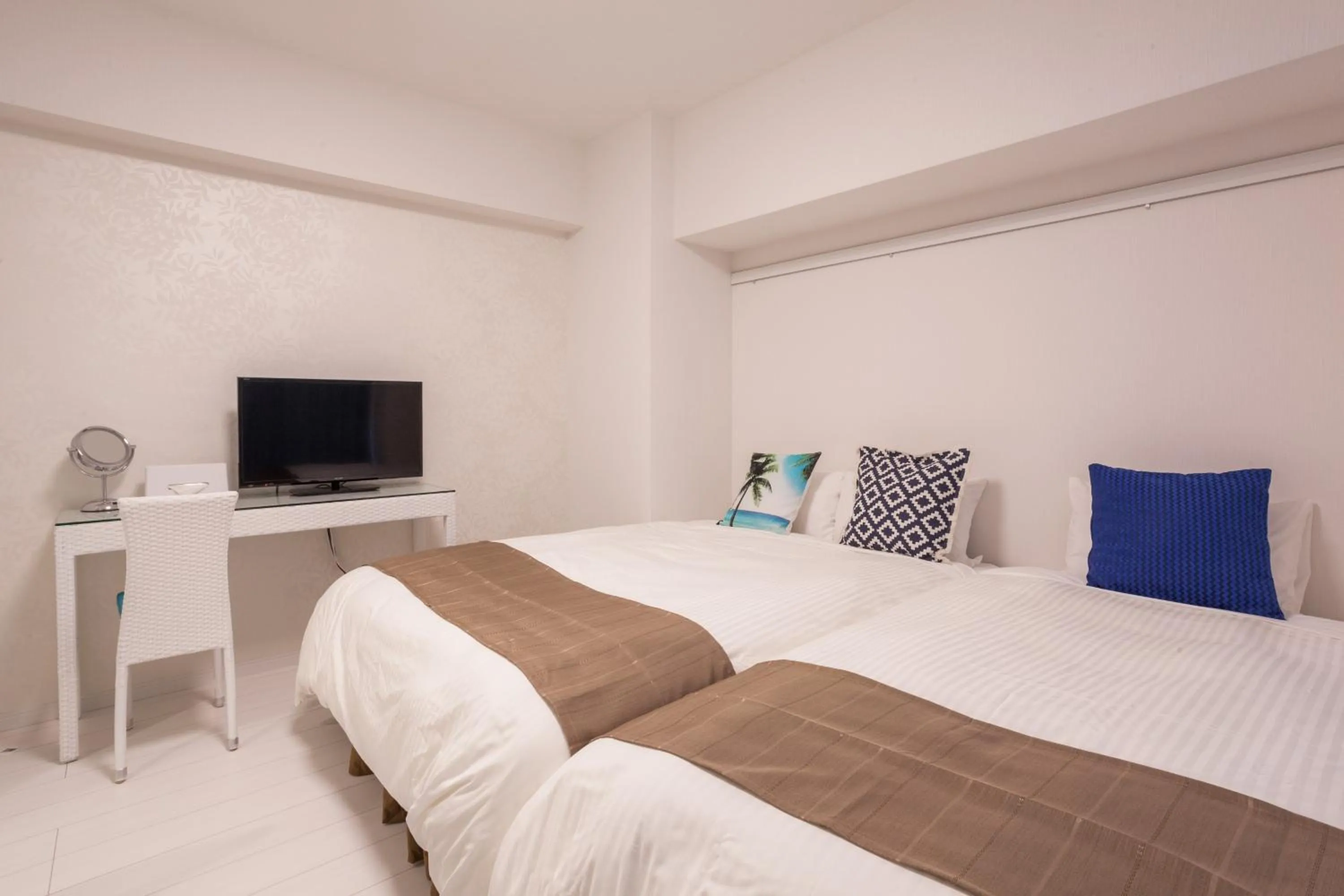 Bed in Living Inn Asahibashiekimae Anex