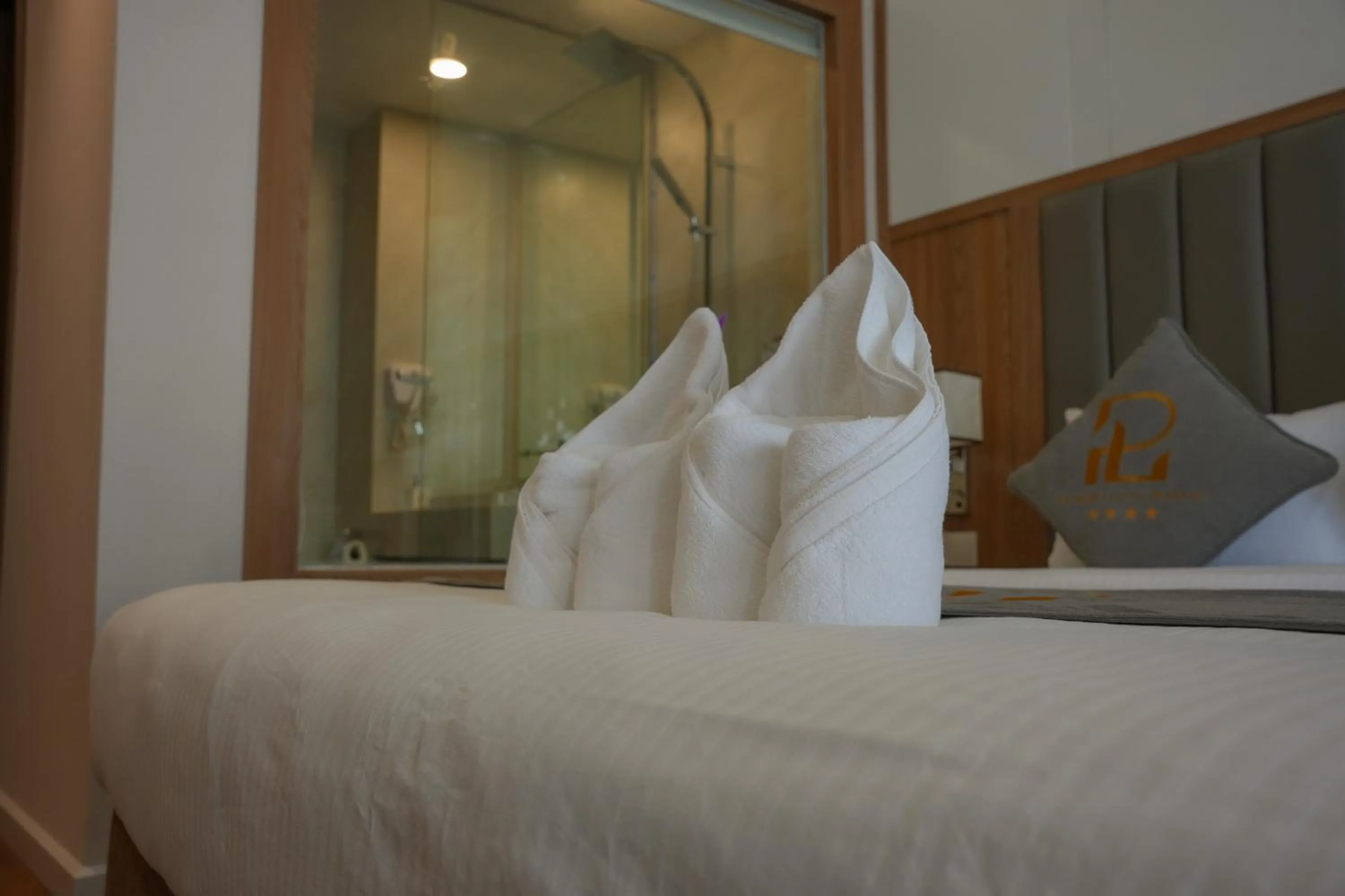 Bed in The Secret Luang Prabang